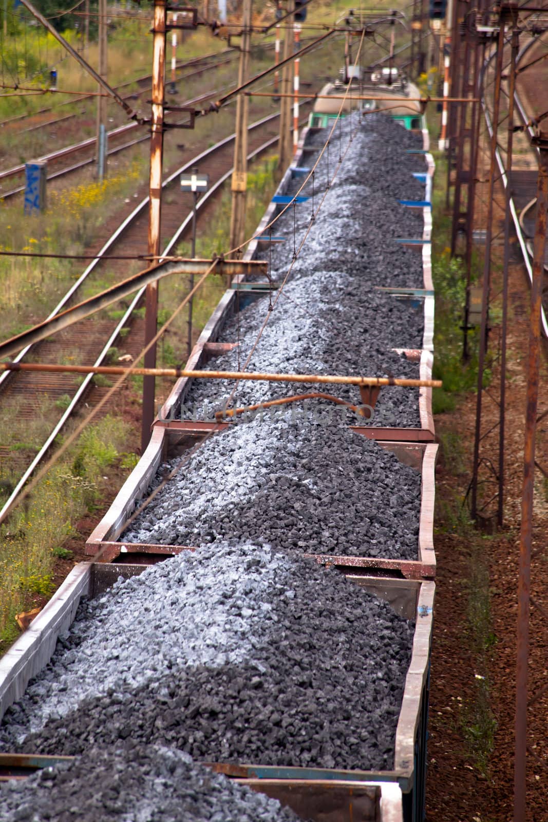 Coal train passing through the station
