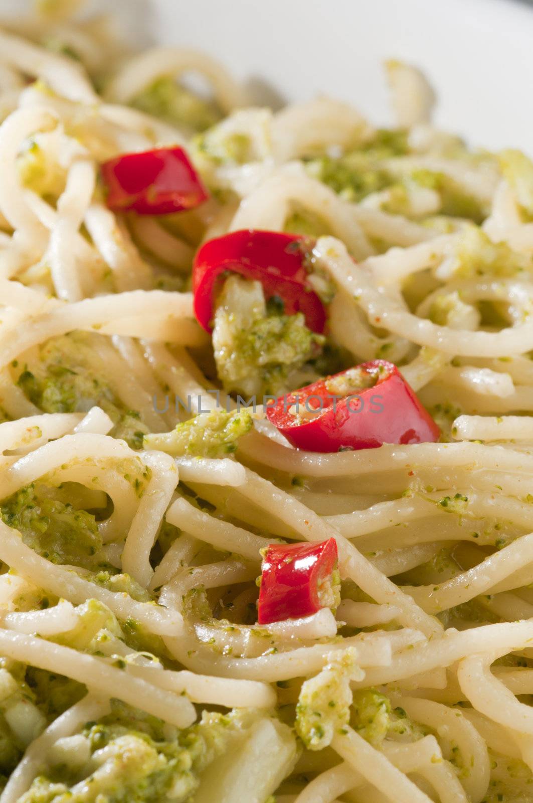 Traditional classic Italian dish of spaghetti with broccoli and hot pepper