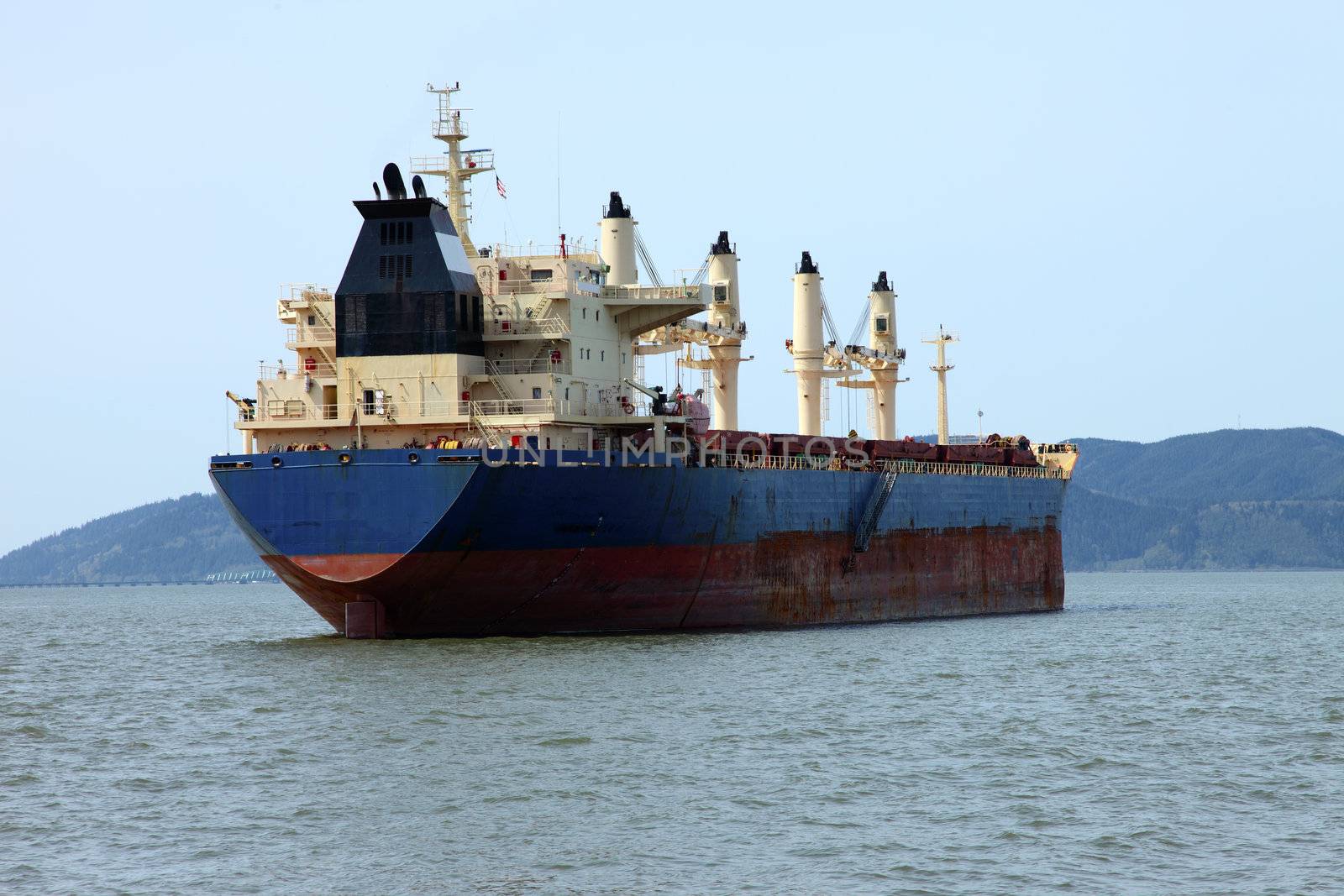 Cargo ship anchored in Astoria a major throughway of trade lanes.