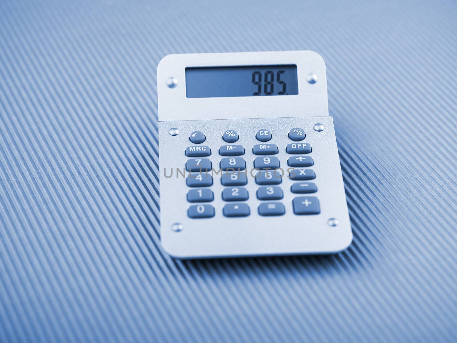 Silver Calculator on office table