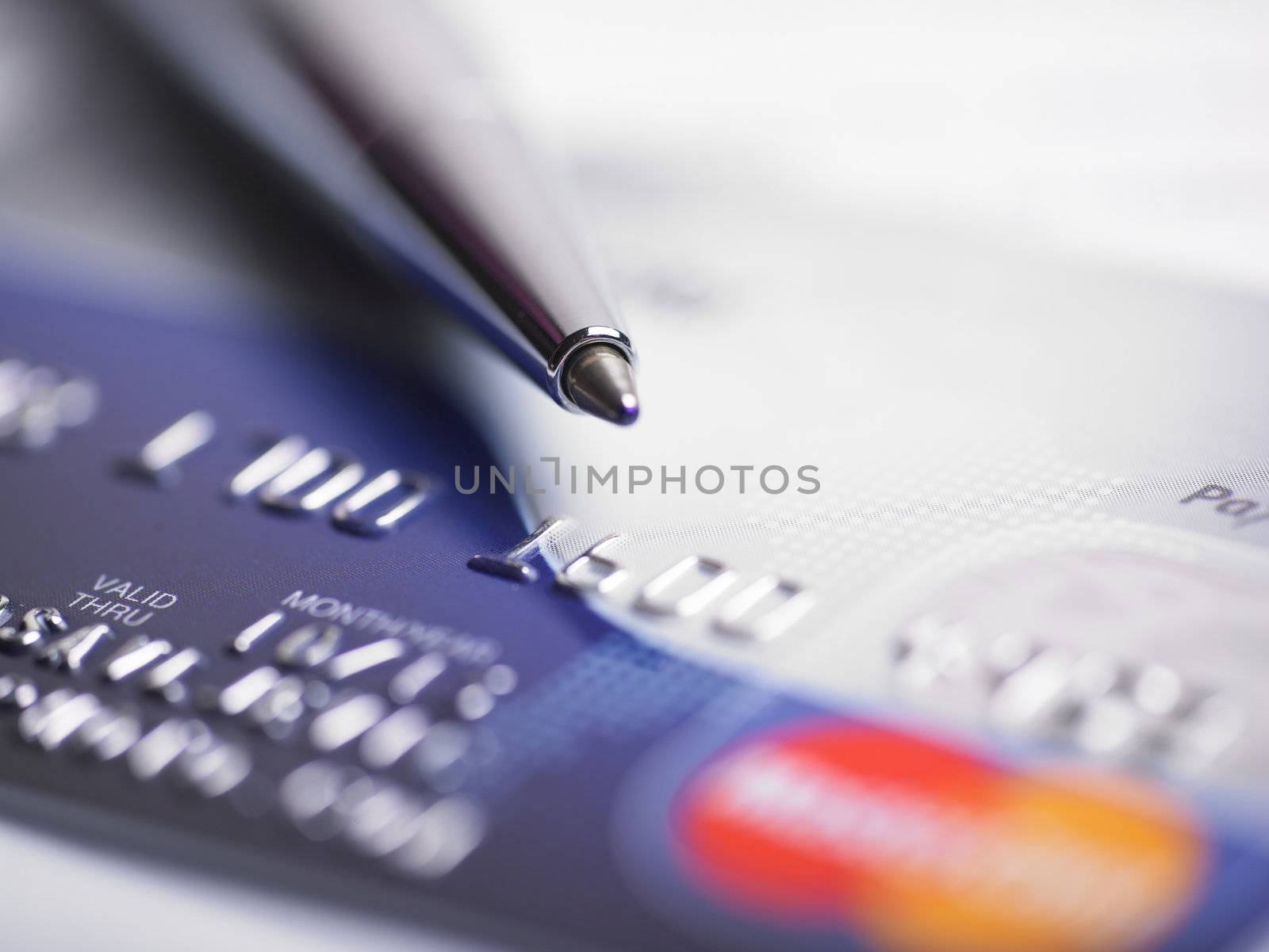 Close up a credit card and pen