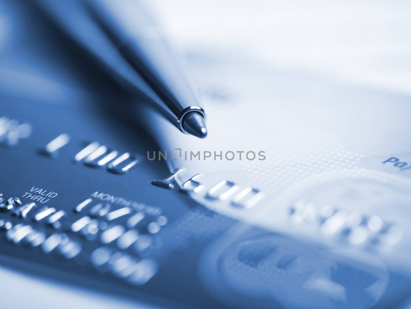 Close up a credit card and pen