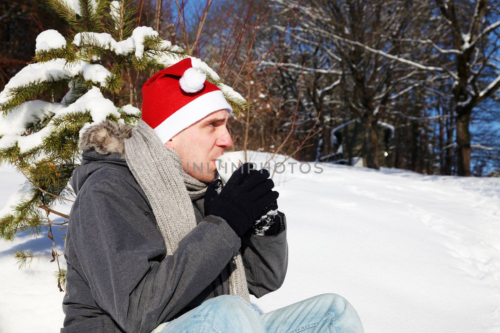 Young man out on a bright winter day