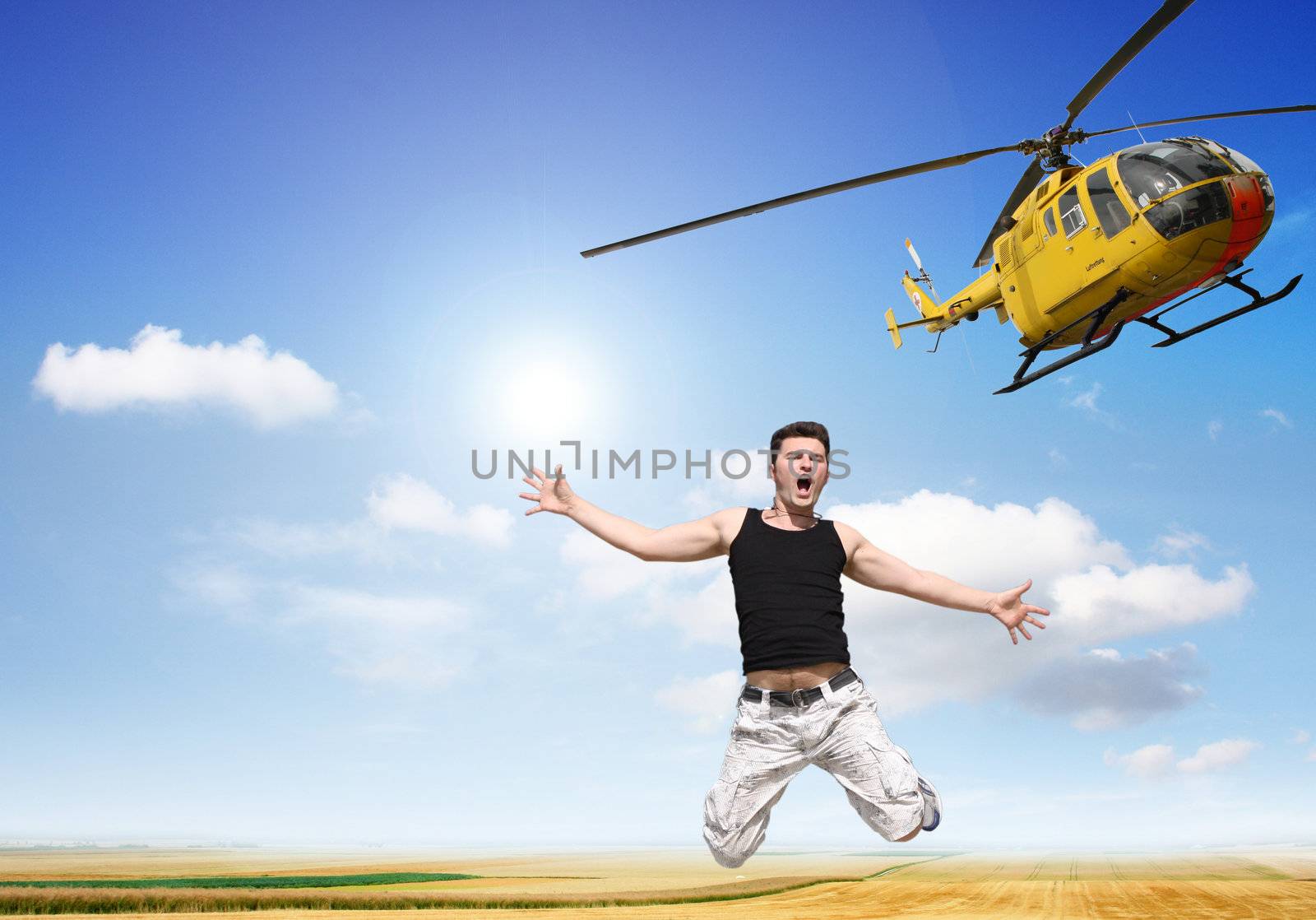 A boy jumps without a parachute from a helicopter