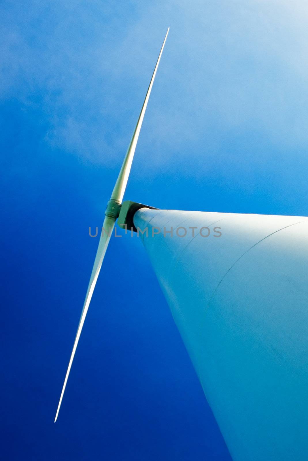 Wind turbine and blue sky by PiLens