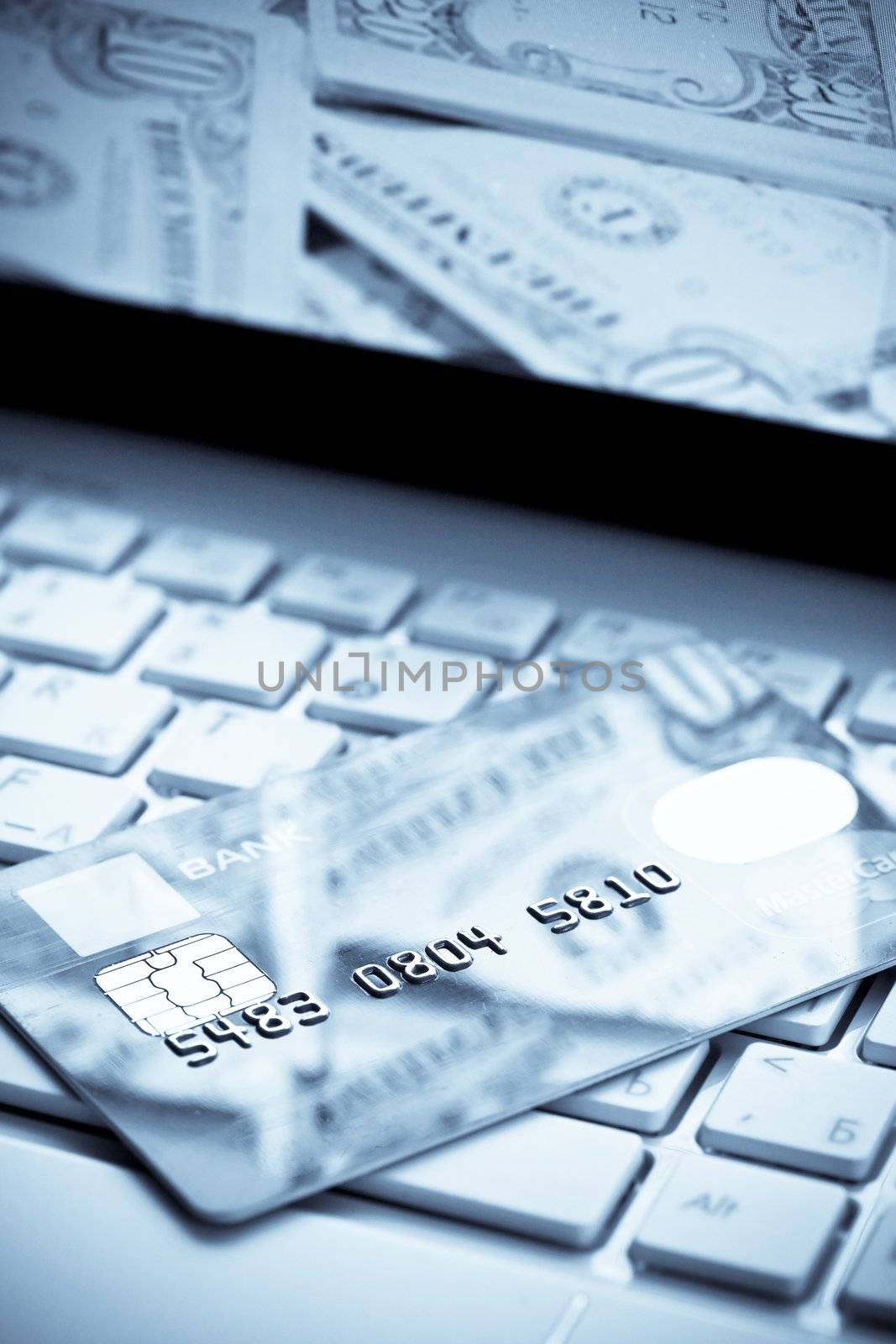 Image of money, credit cards, checks and coins