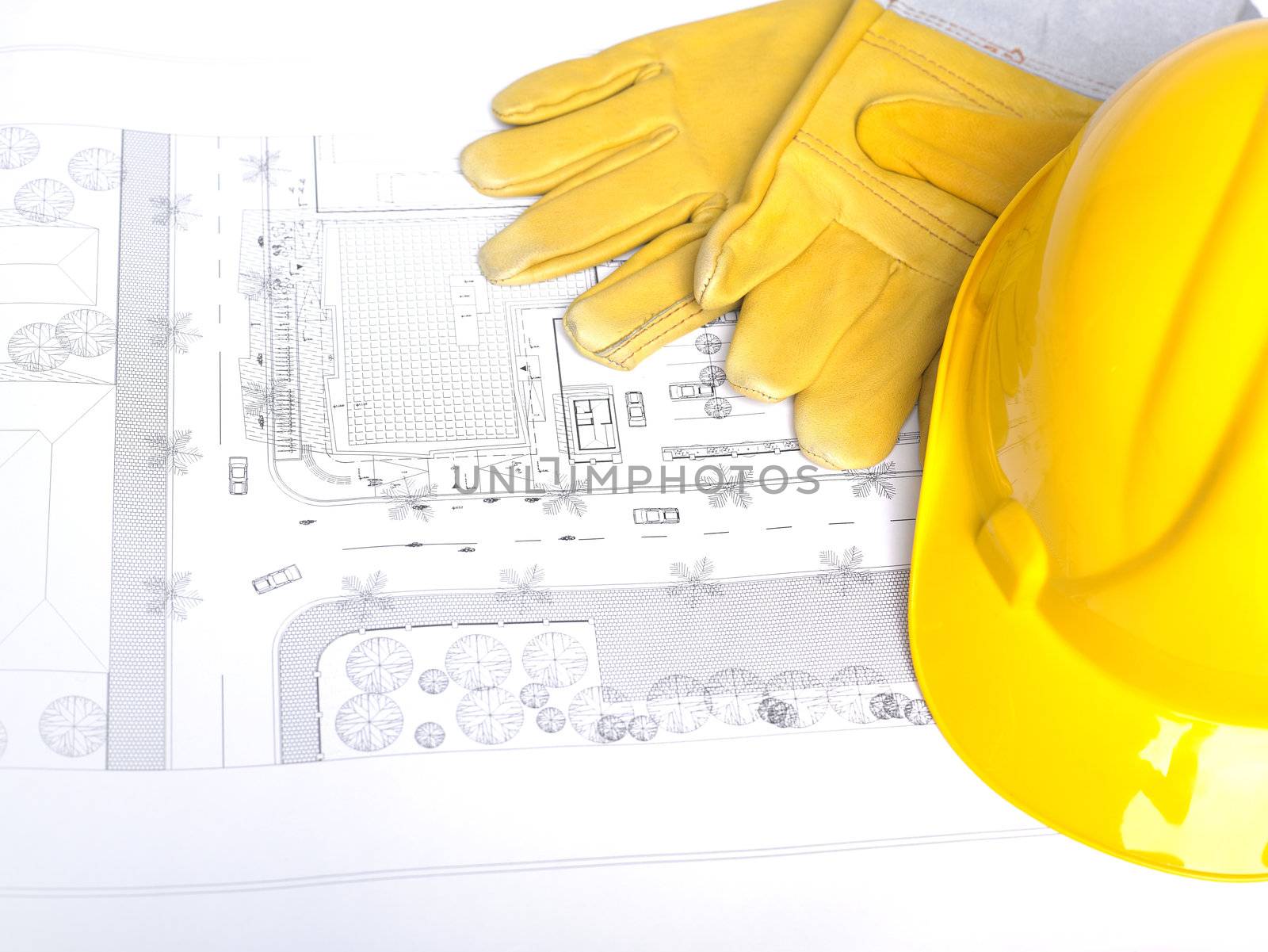Hard Hat And Leather Gloves on white