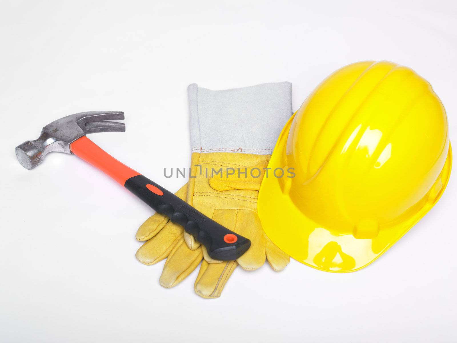 Hammer Hard Hat And Leather Gloves on white