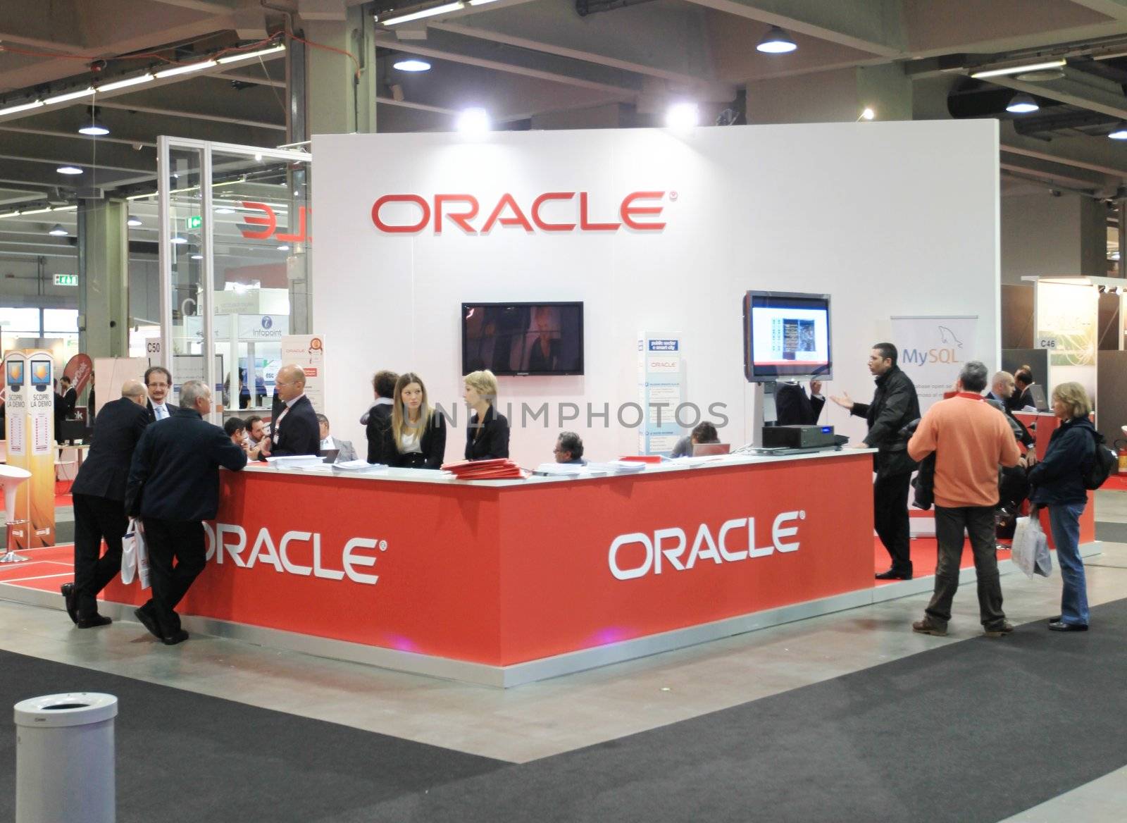 People visit Oracle technologies stand during SMAU, international fair of business intelligence and information technology in Milan, Italy.