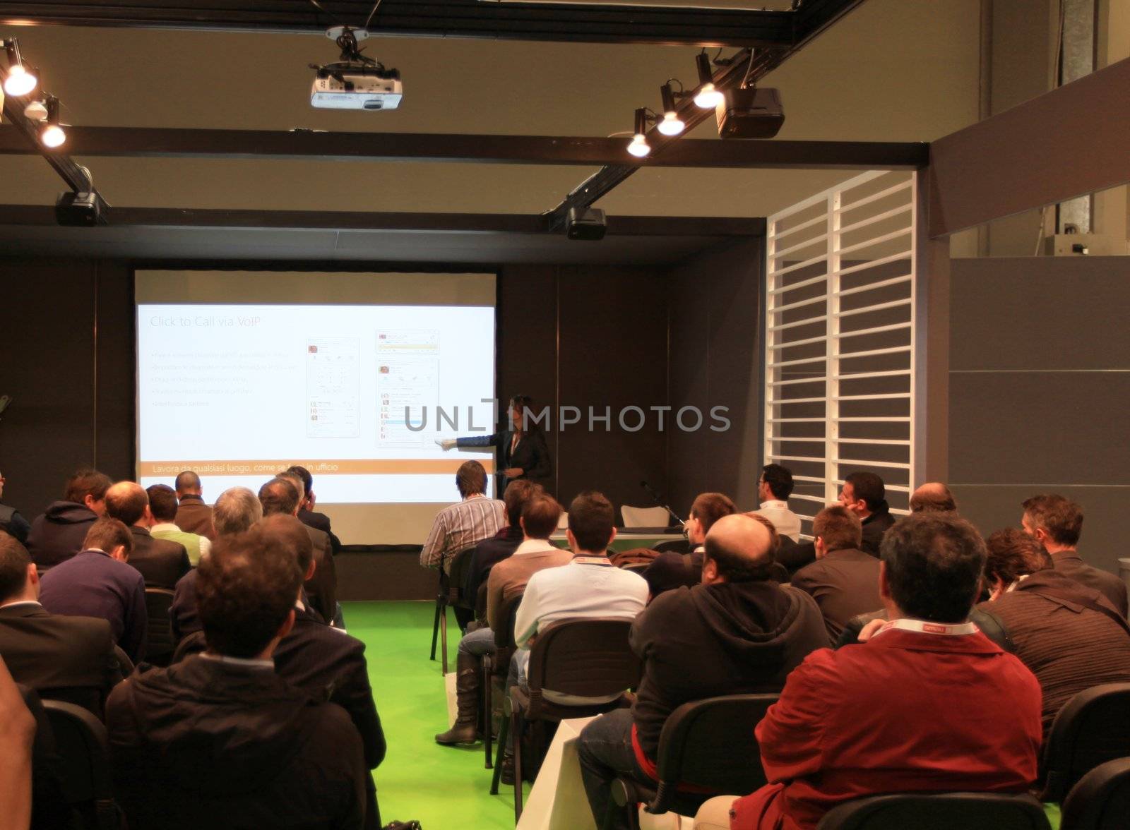People during a business conference at SMAU, international fair of business intelligence and information technology in Milan, Italy.