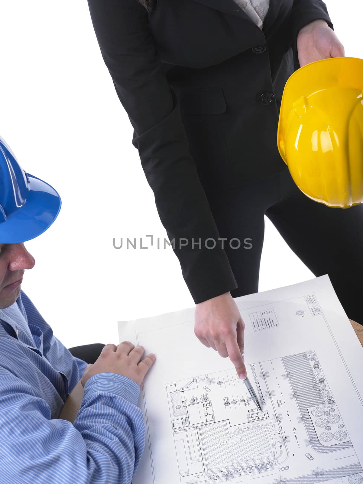 Two architects with helmet on meeting