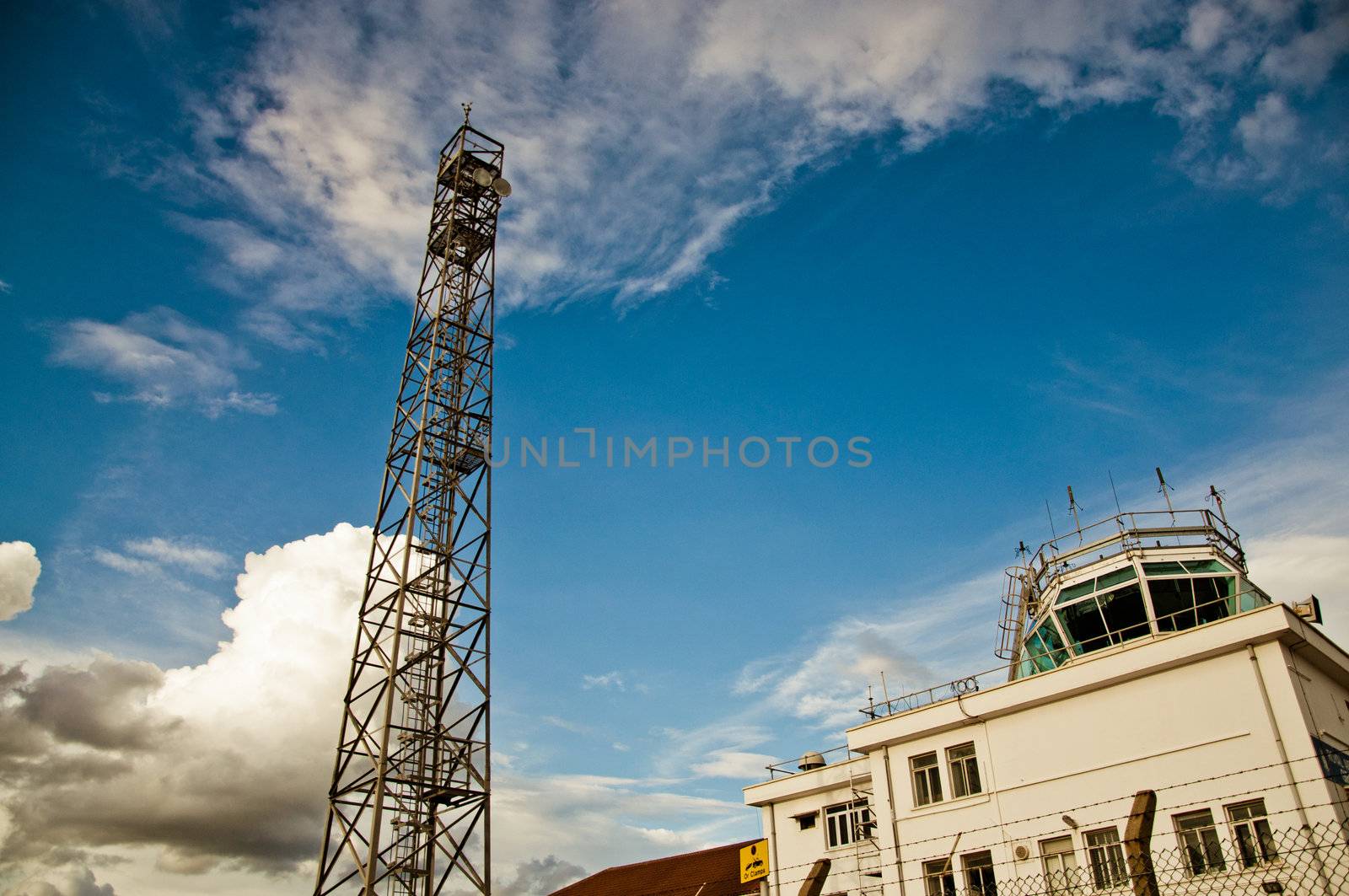 Airport Antenna located in the Gibraltar Airport, North Face. in a cloudy day at the end of the summer.