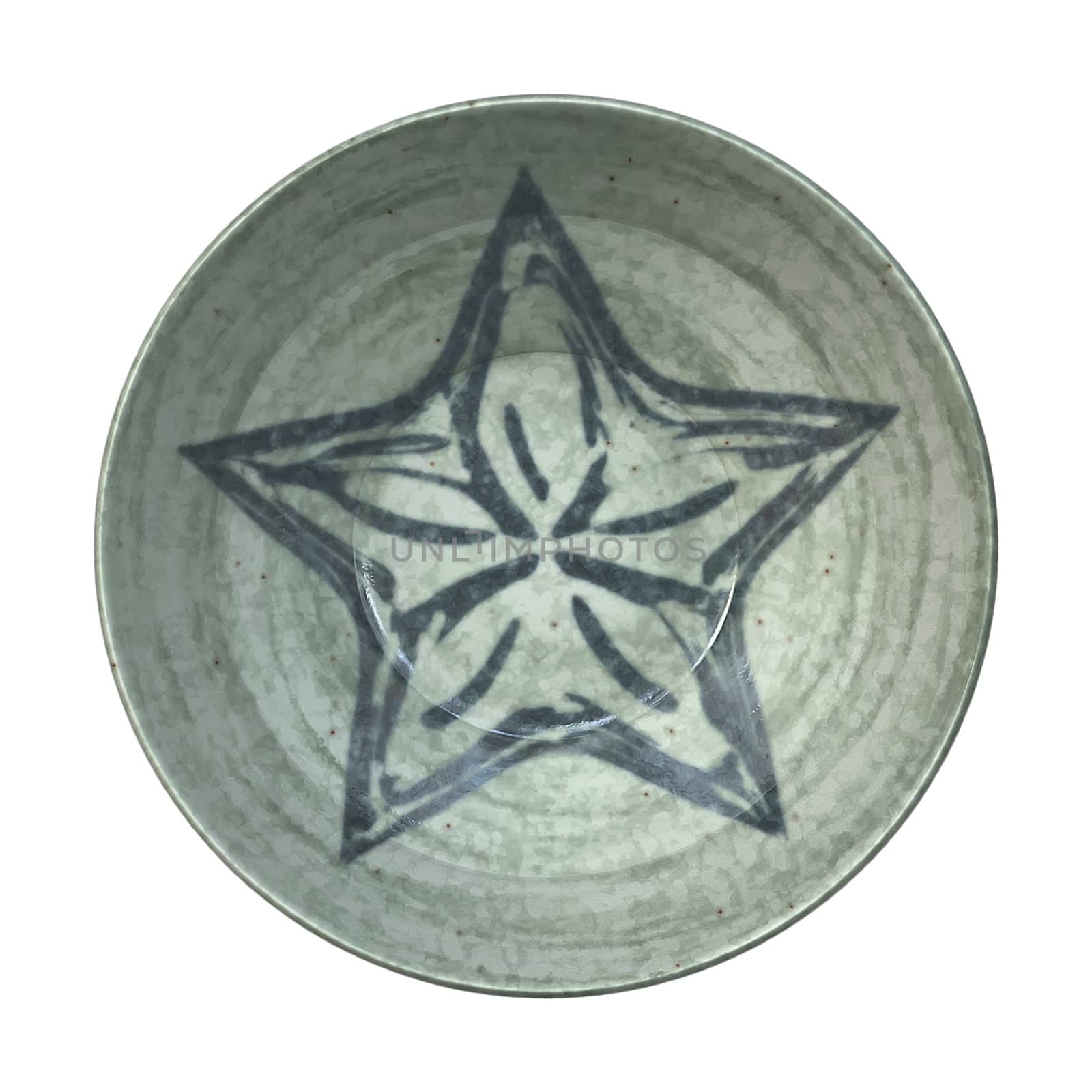 An image of a nice pottery plate with a star