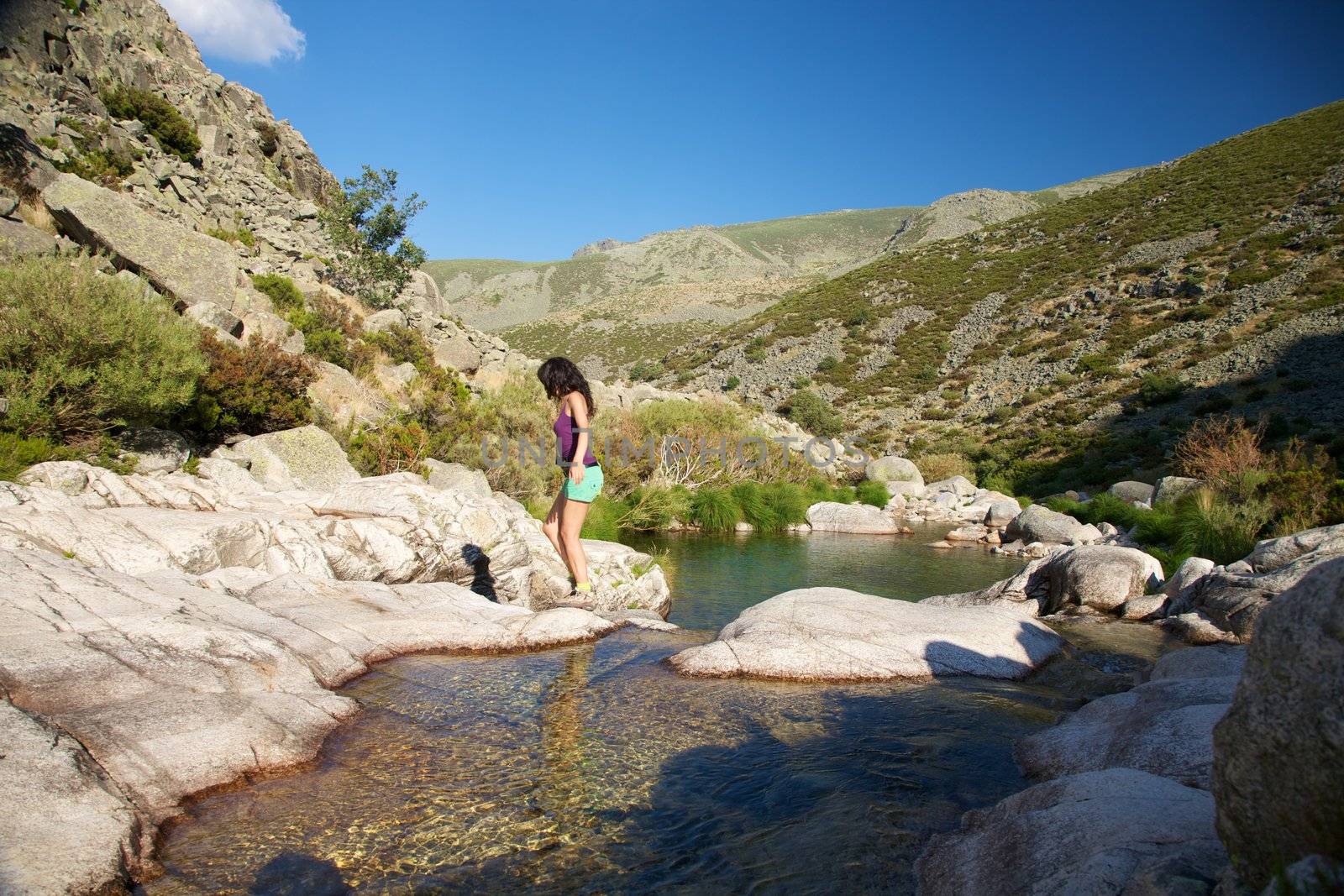 summer trekking at a Gredos river by quintanilla
