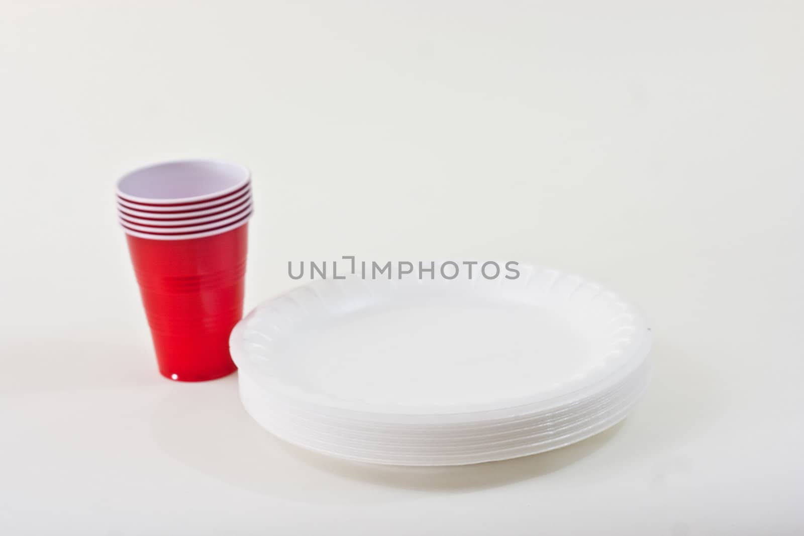 Styrofoam Plates and Cups on a white background.