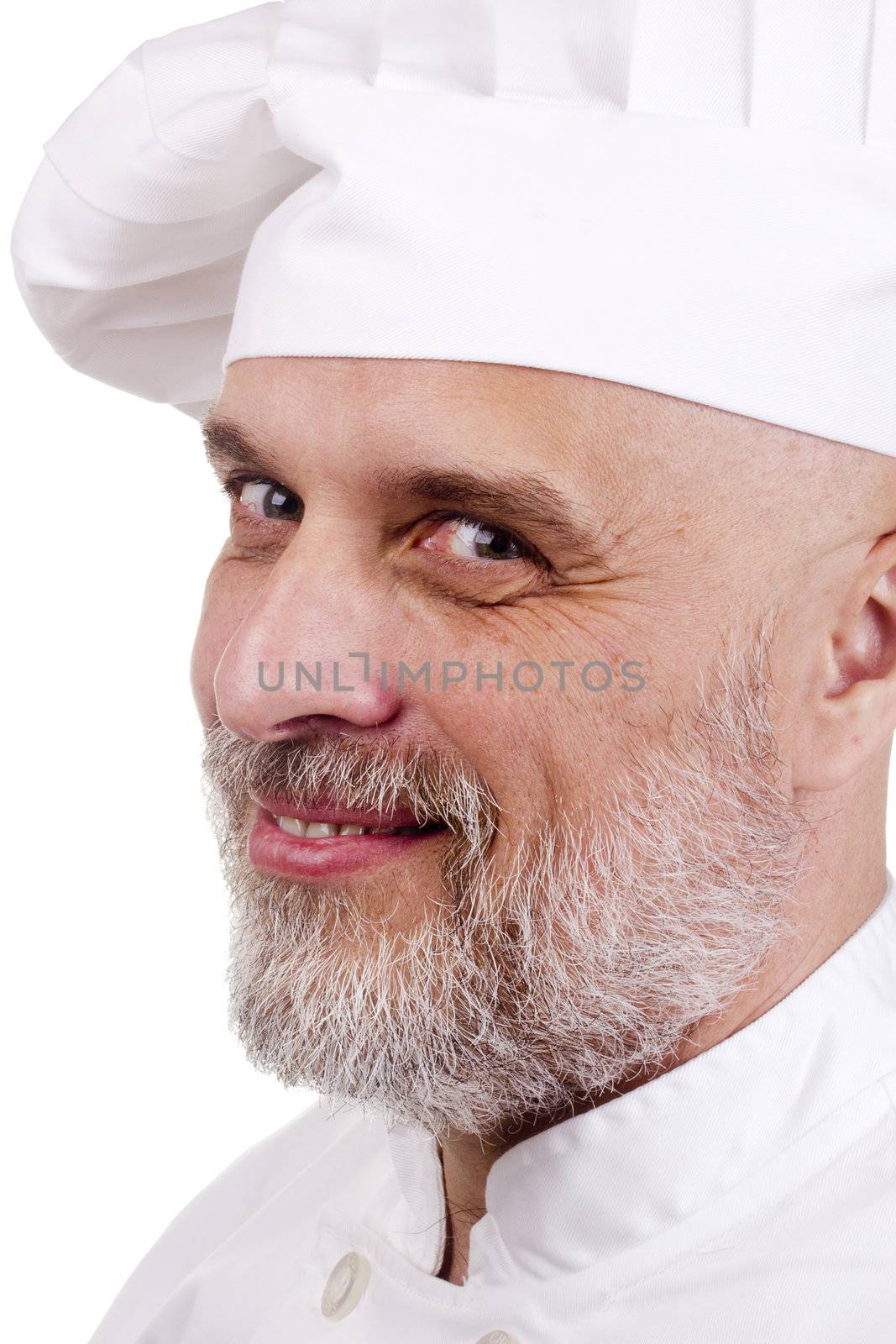 Portrait of a happy chef in a chef's hat.