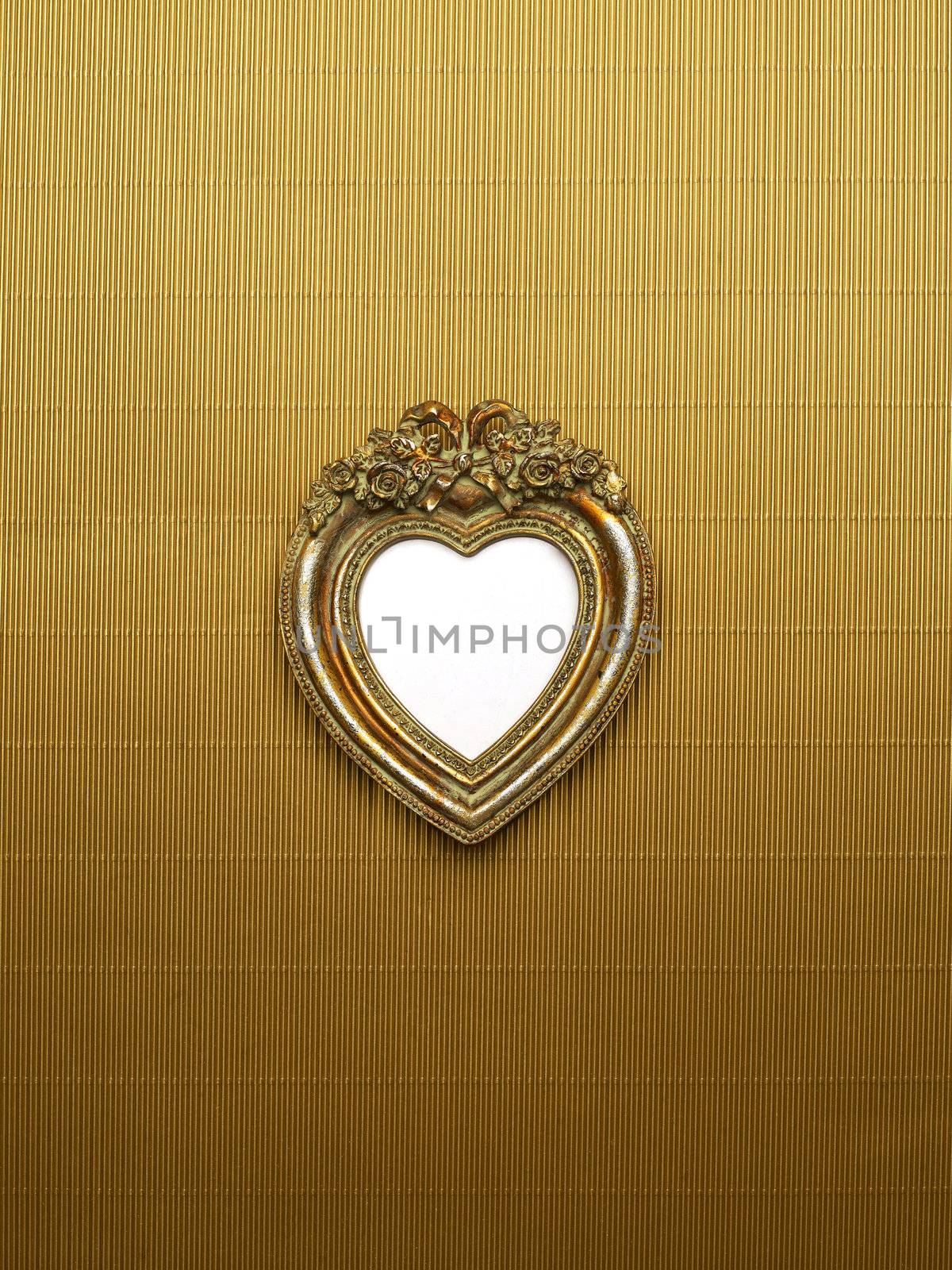 Heart Picture Frame On Gold Background by adamr