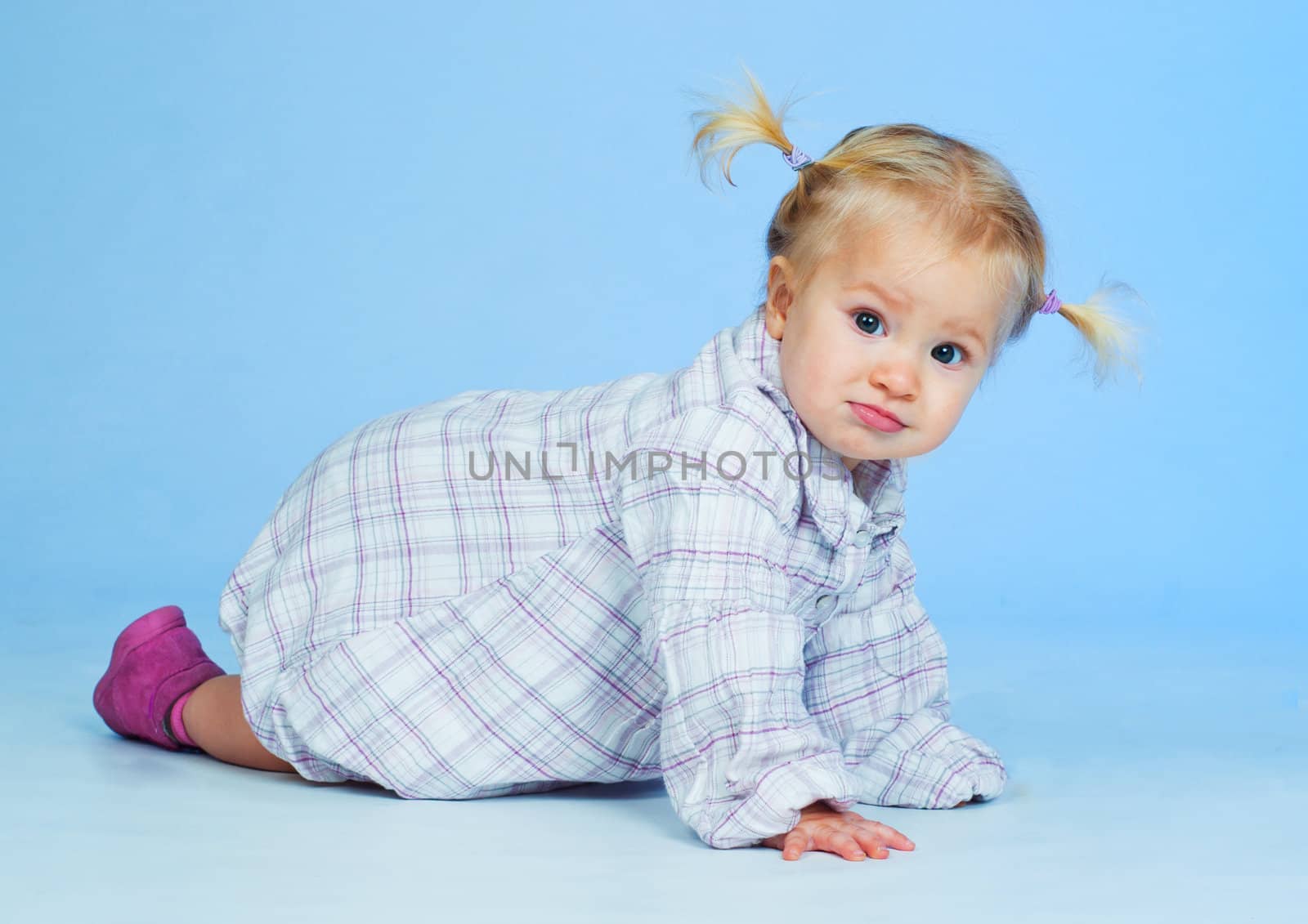 cute baby girl in black pink and white stylish outfit in studio