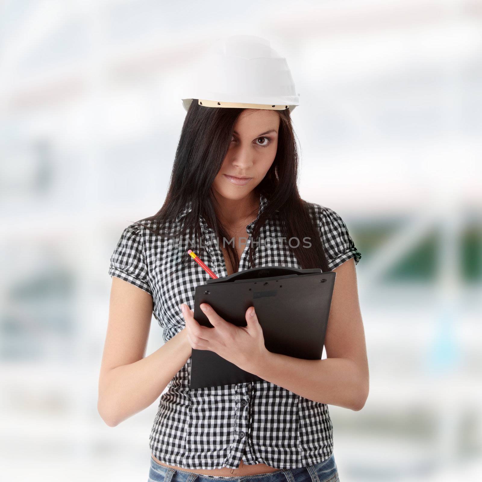 Engineer woman in white helmet