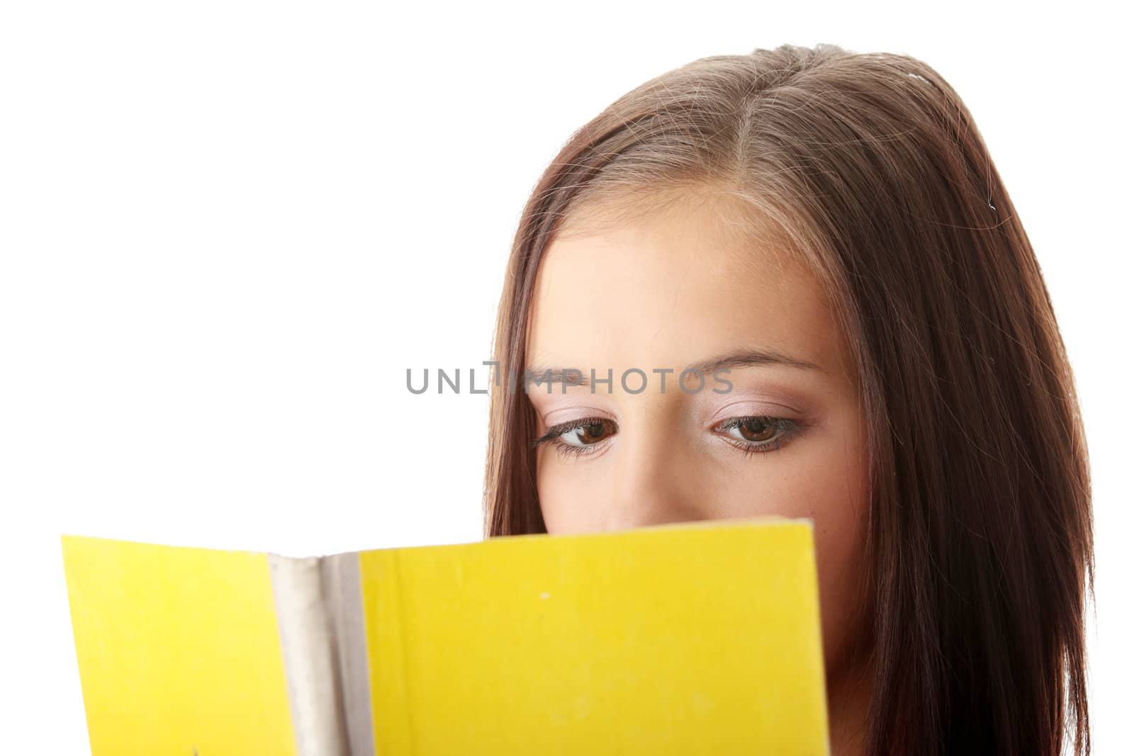 Young caucasian woman reading a book isolated on white background