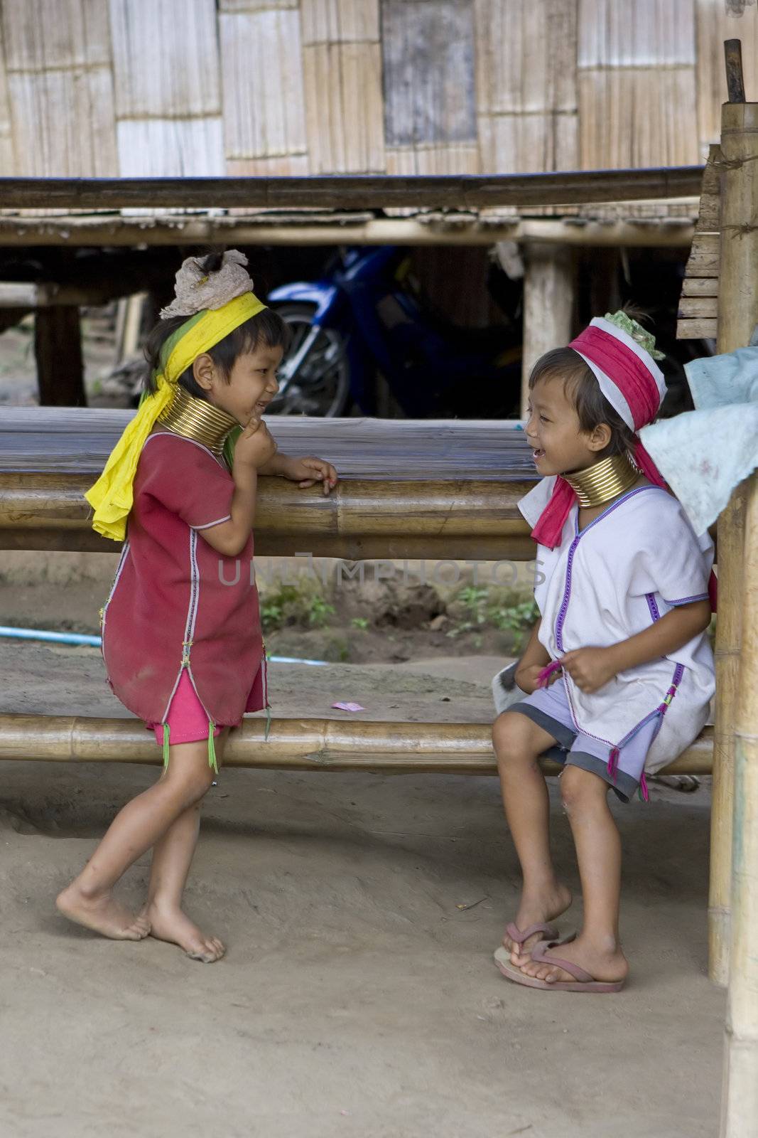 Long Necked Karen children playing in Huai Seau Tao village on Sept 23, 2008, Mae Hong Son, Thailand. The Kayan tribe has about 50 000 persons