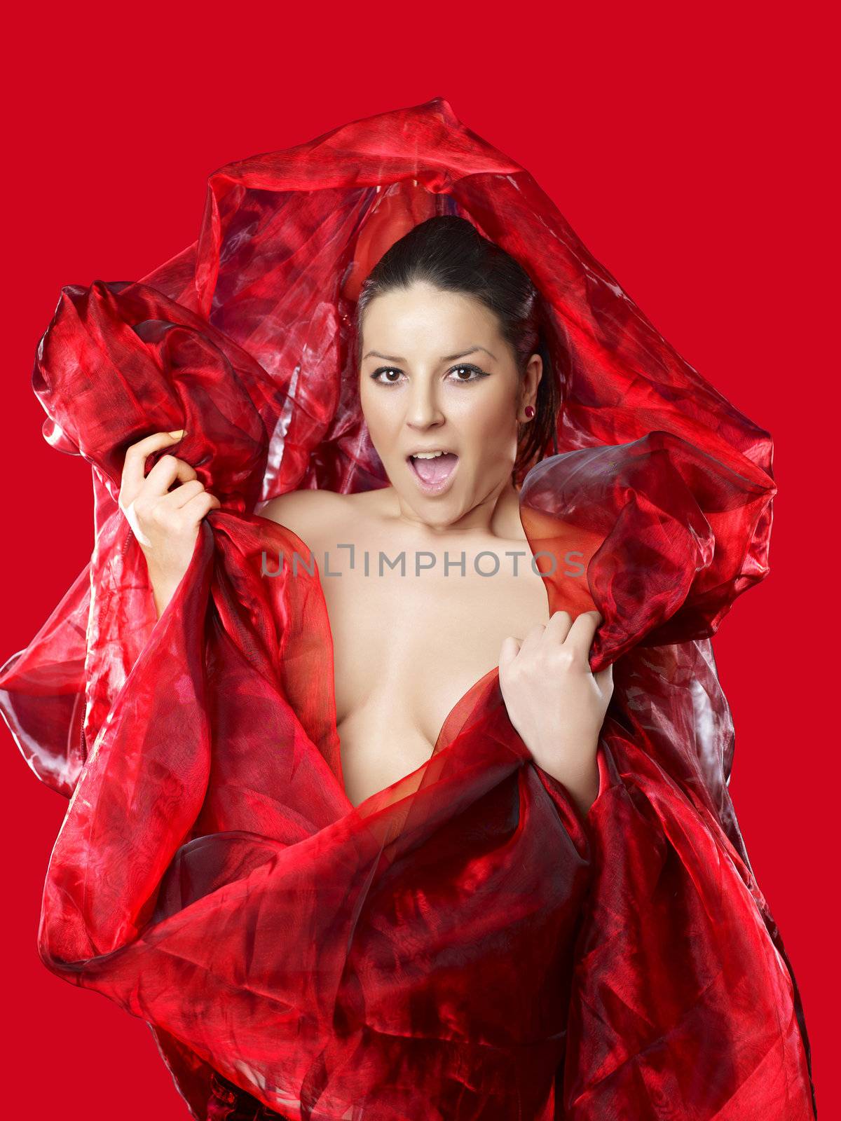 Beautiful young woman in red silk by adamr