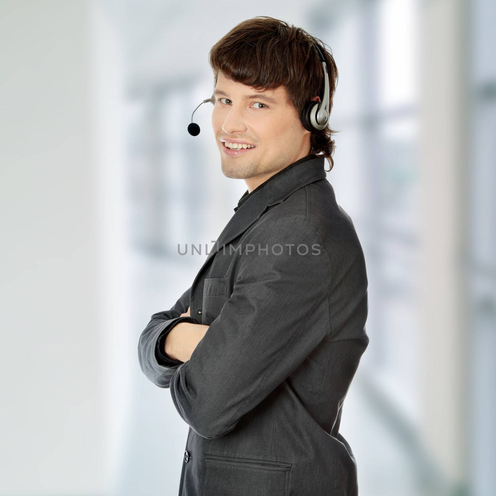 Charming customer service representative with headset on