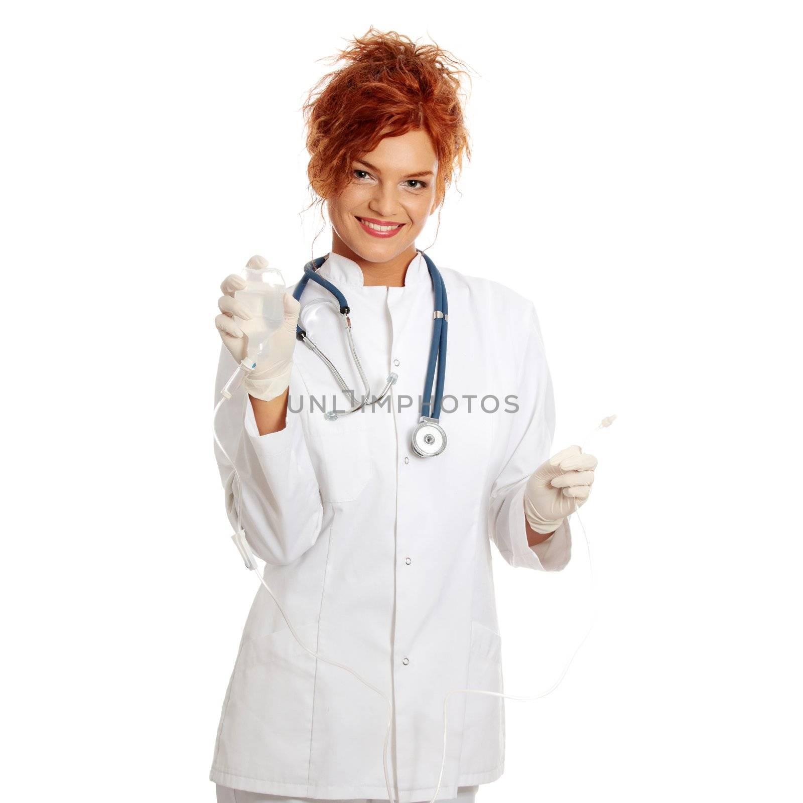 Portrait of a nurse making a drip, isolated on white