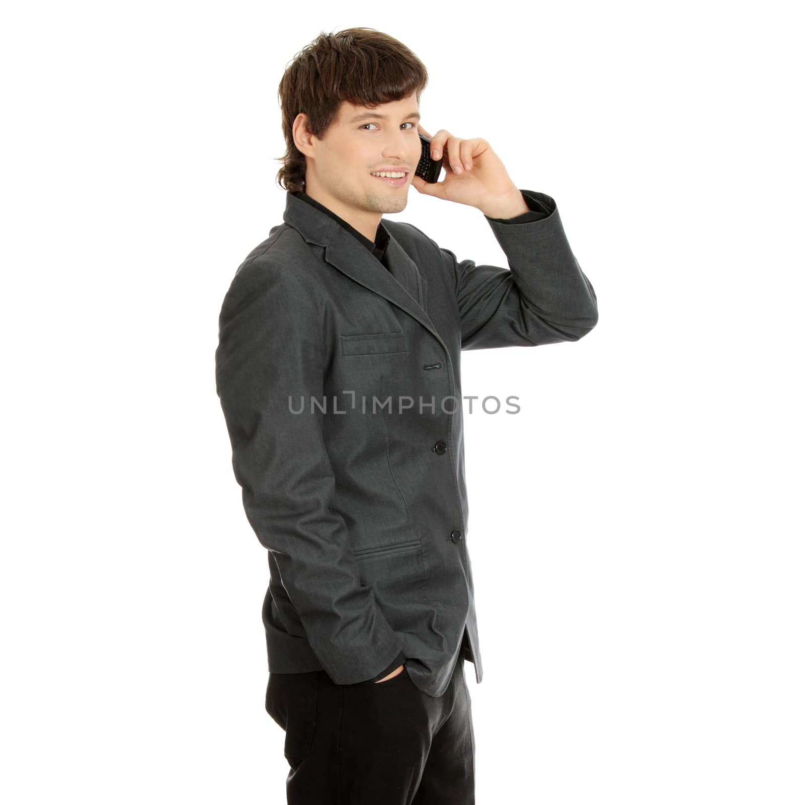 A handsome happy business man using mobile phone, isolated on white