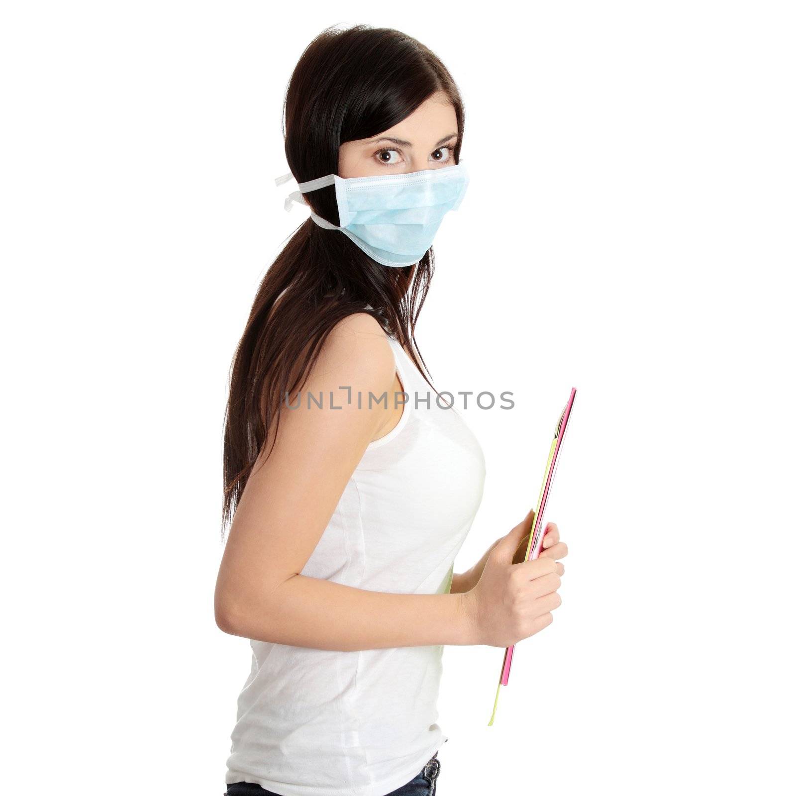 Caucasian student woman with mask on her face. She is defending her self from viruses. Isolated on white