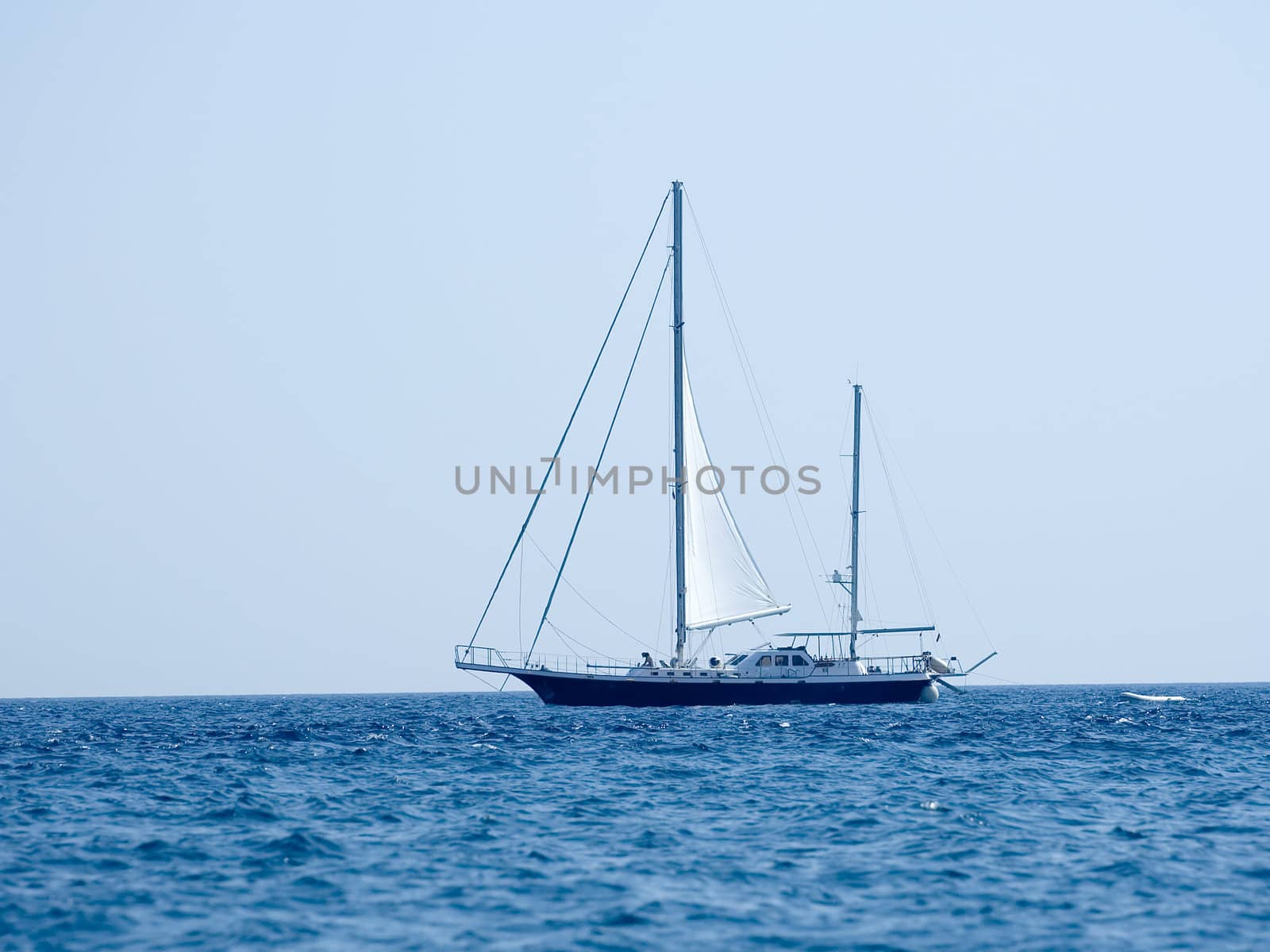 Sailing boat on the open sea