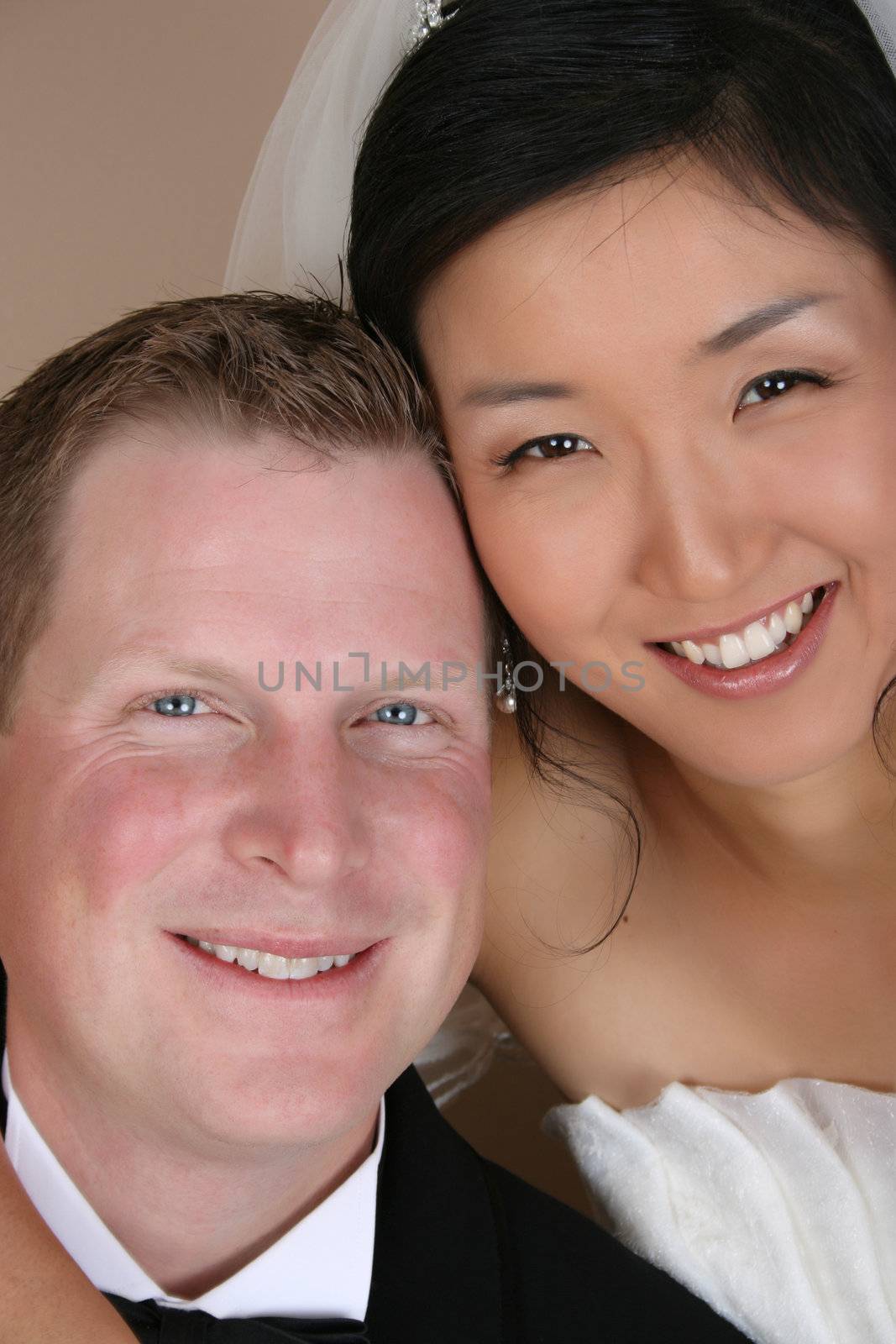 Beautiful couple on their wedding day in traditional attire 