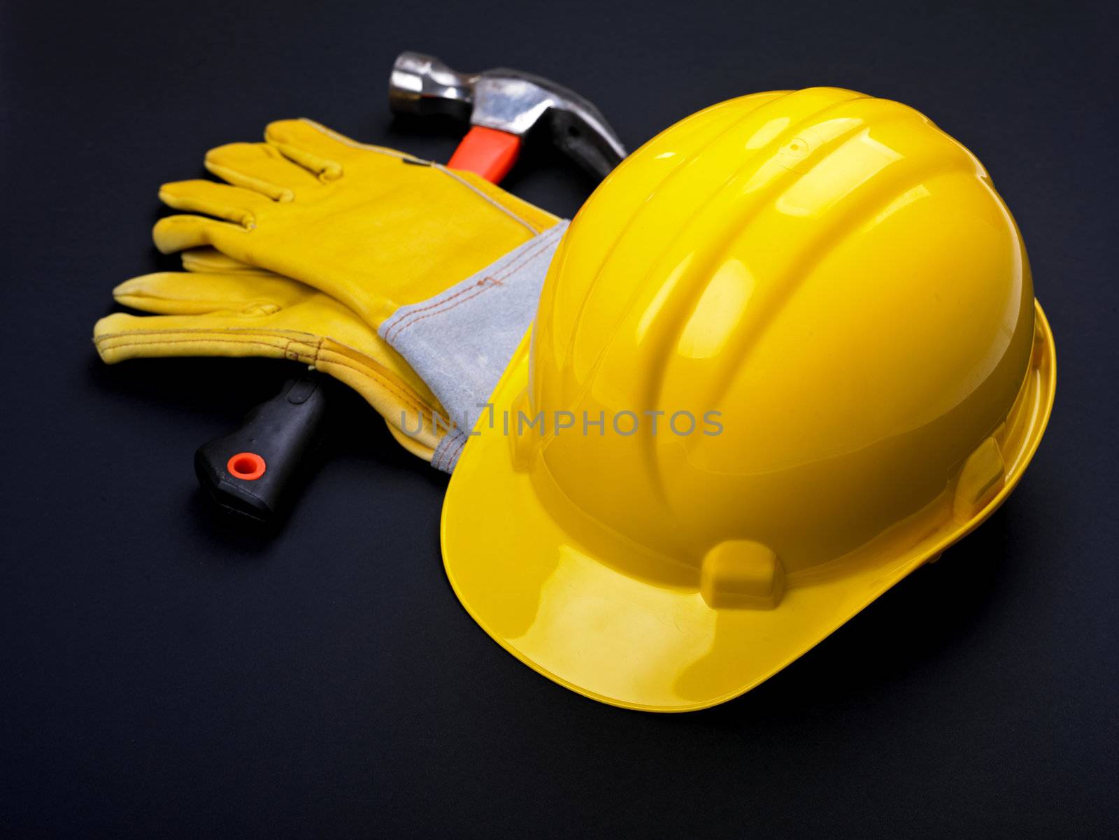 HardHat Hammer And Leather Gloves on black