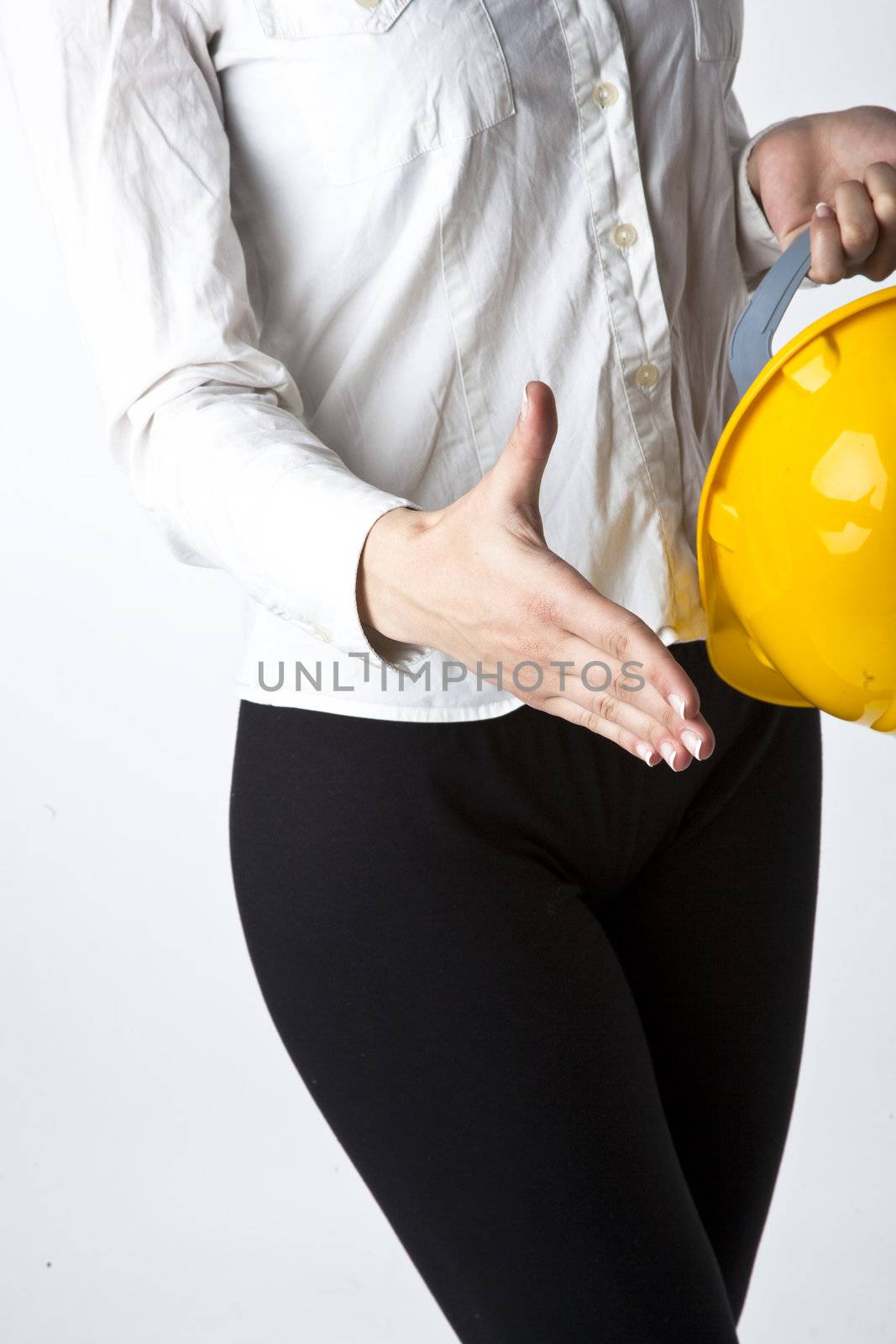 Businesswoman with hardhat Ready For Handshaking by adamr