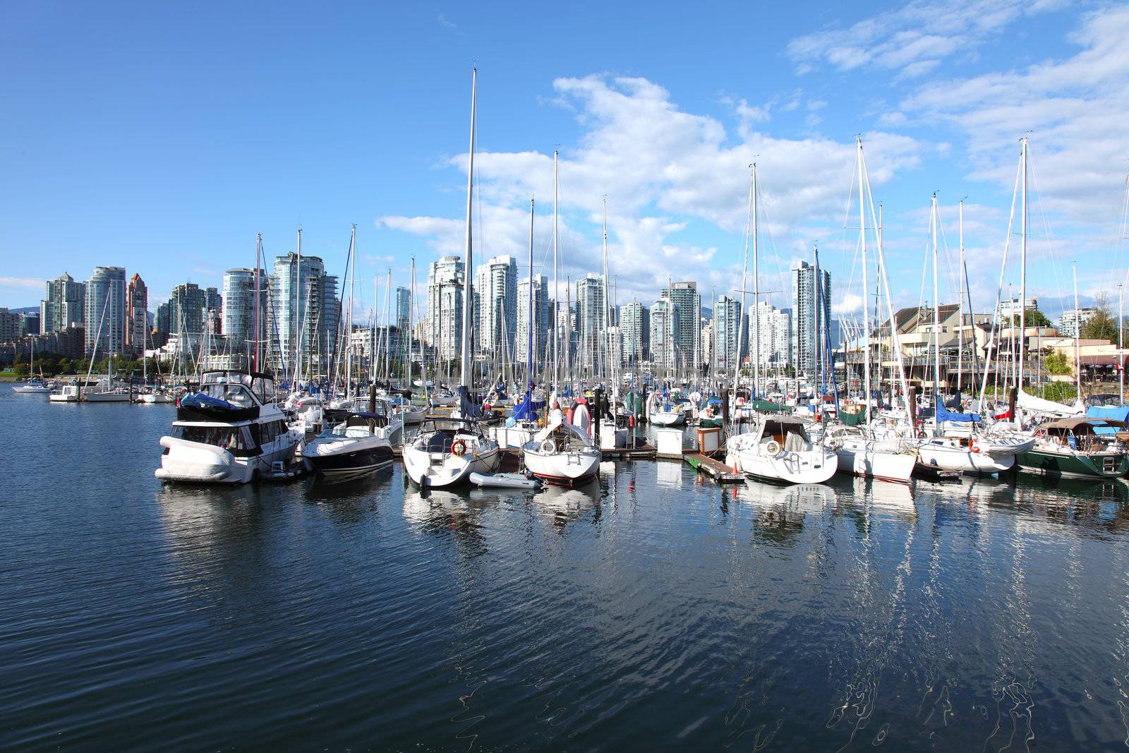 Vancouver BC waterfront skyline & sailboats. by Rigucci