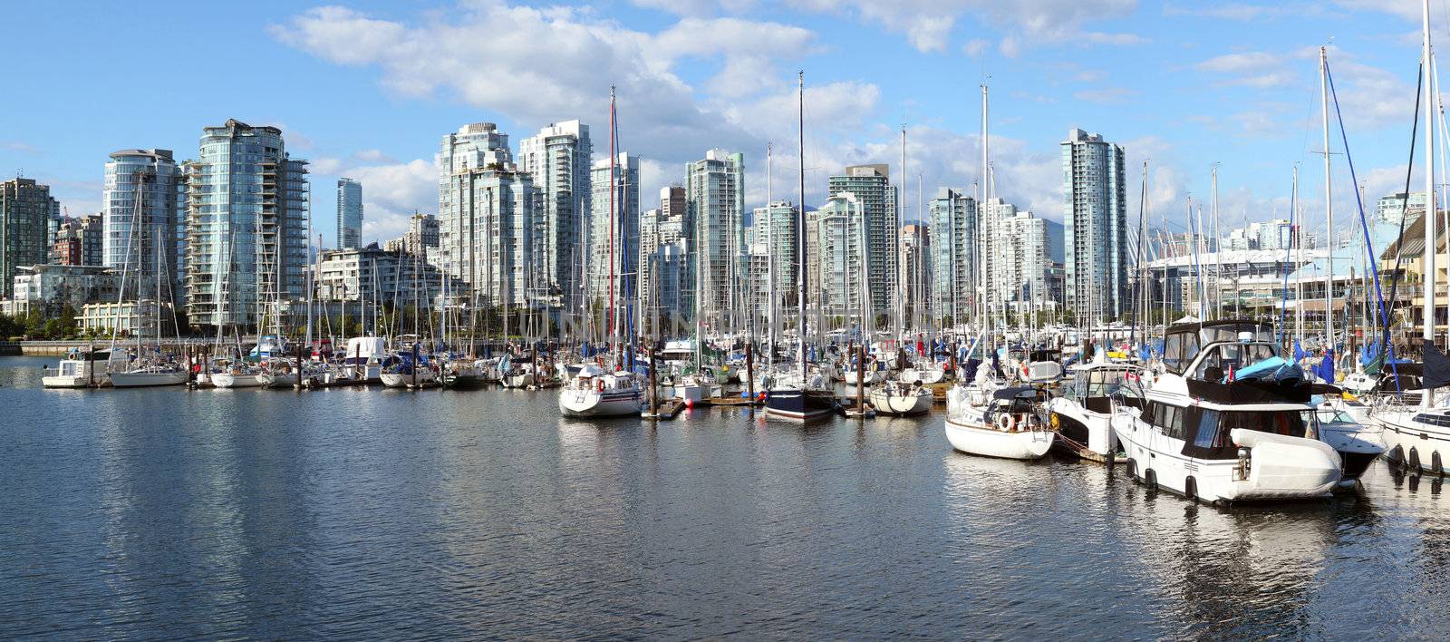 A panorama of False Creek marina and the south Vancouver BC skyline, Canada. 