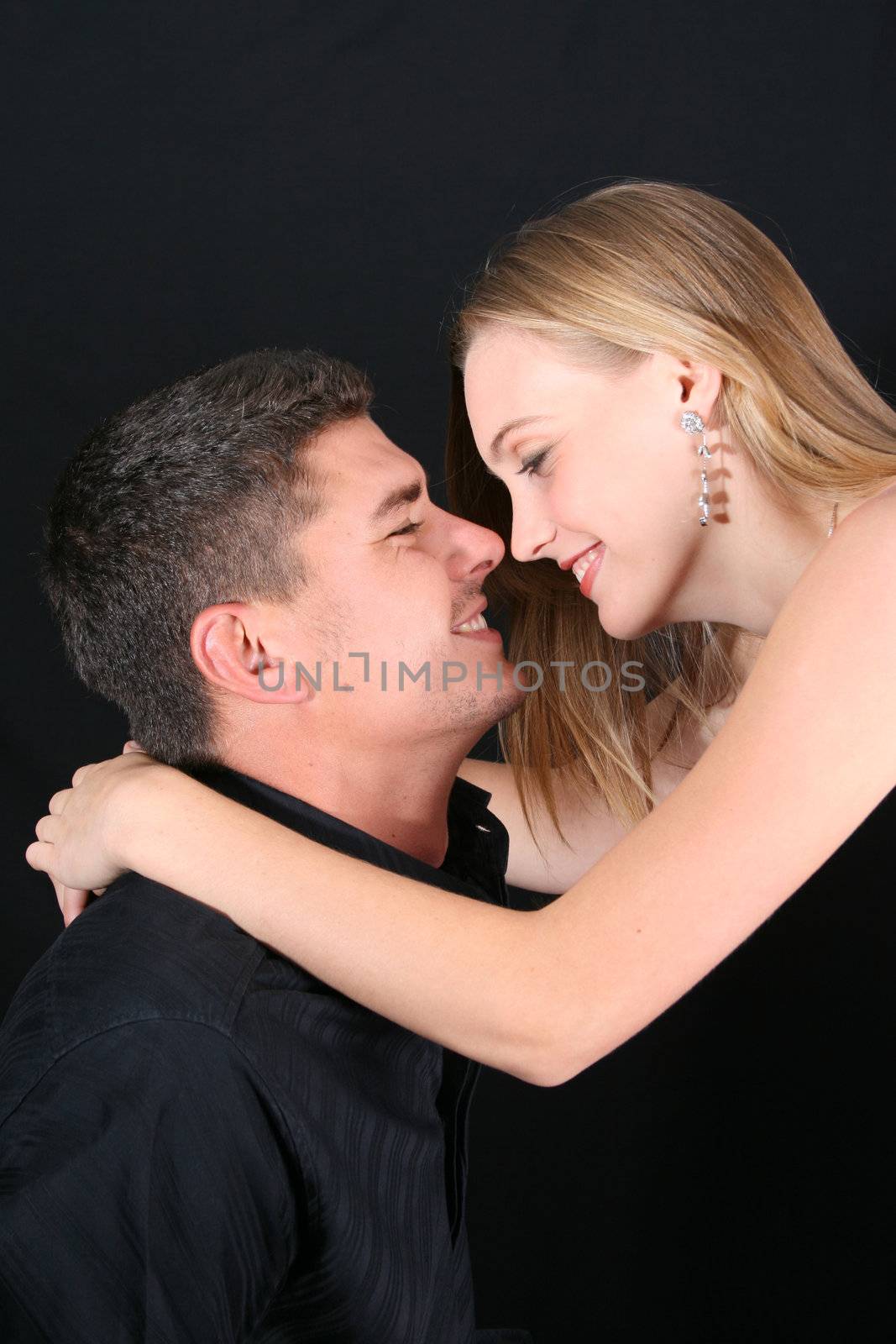 Young couple in love, faces close to one another