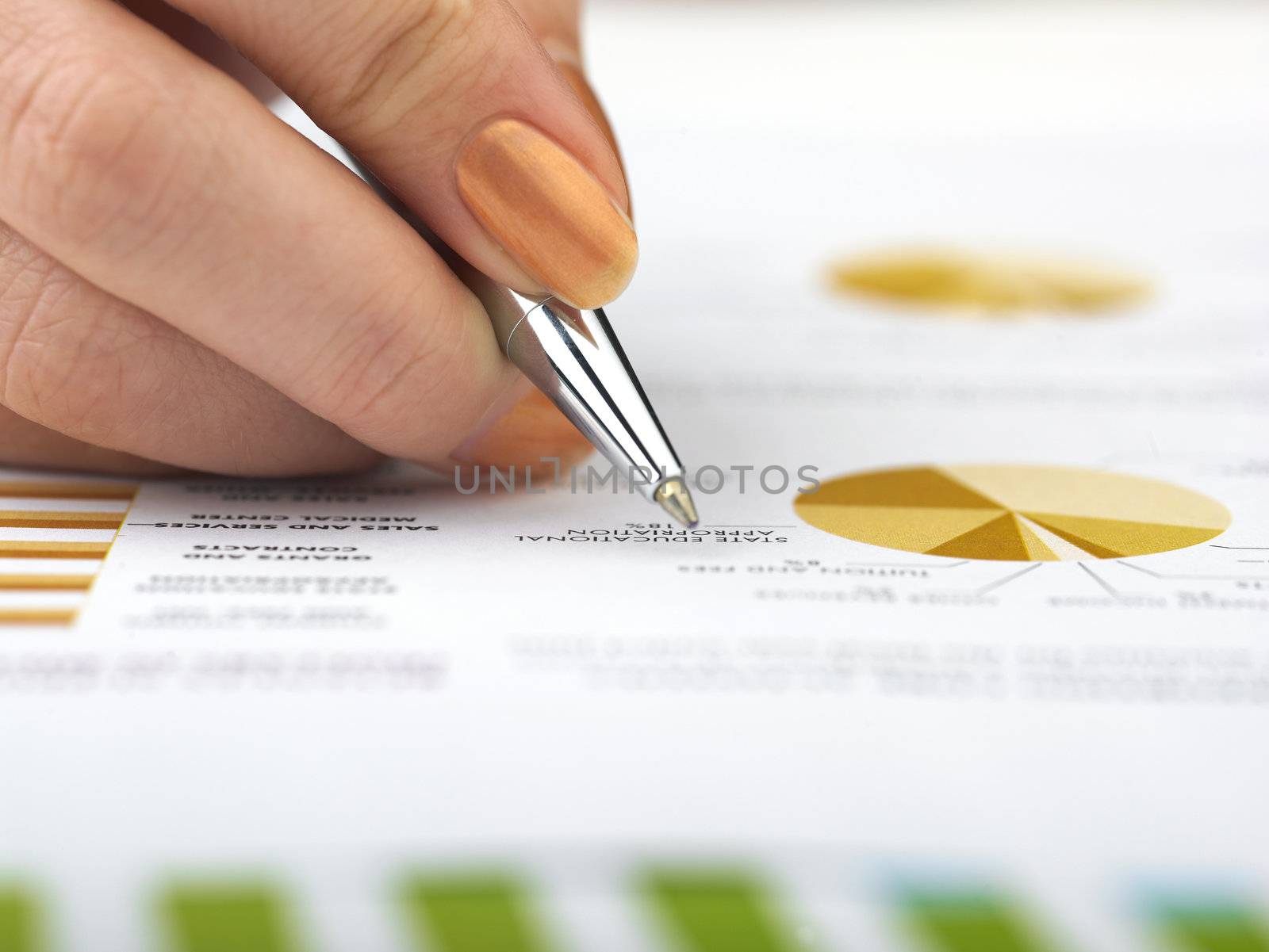 Market Analyze - pen and calculator on papers