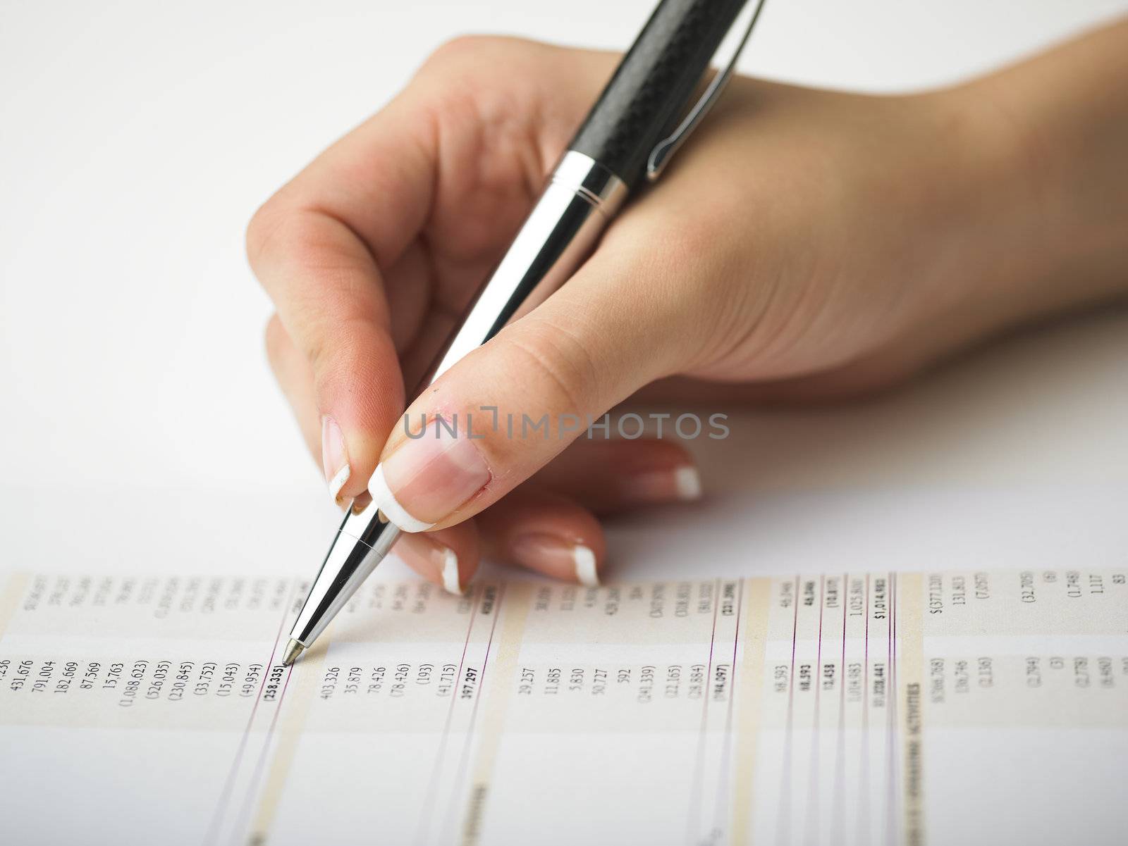 Market Analyze - pen and calculator on papers