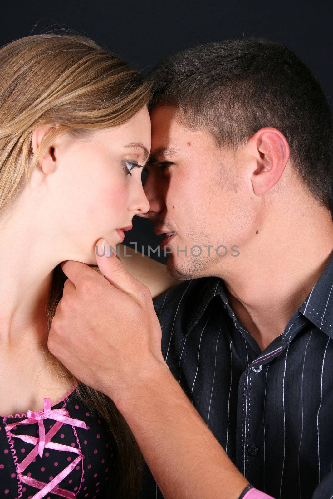 Young couple in love, faces close to one another