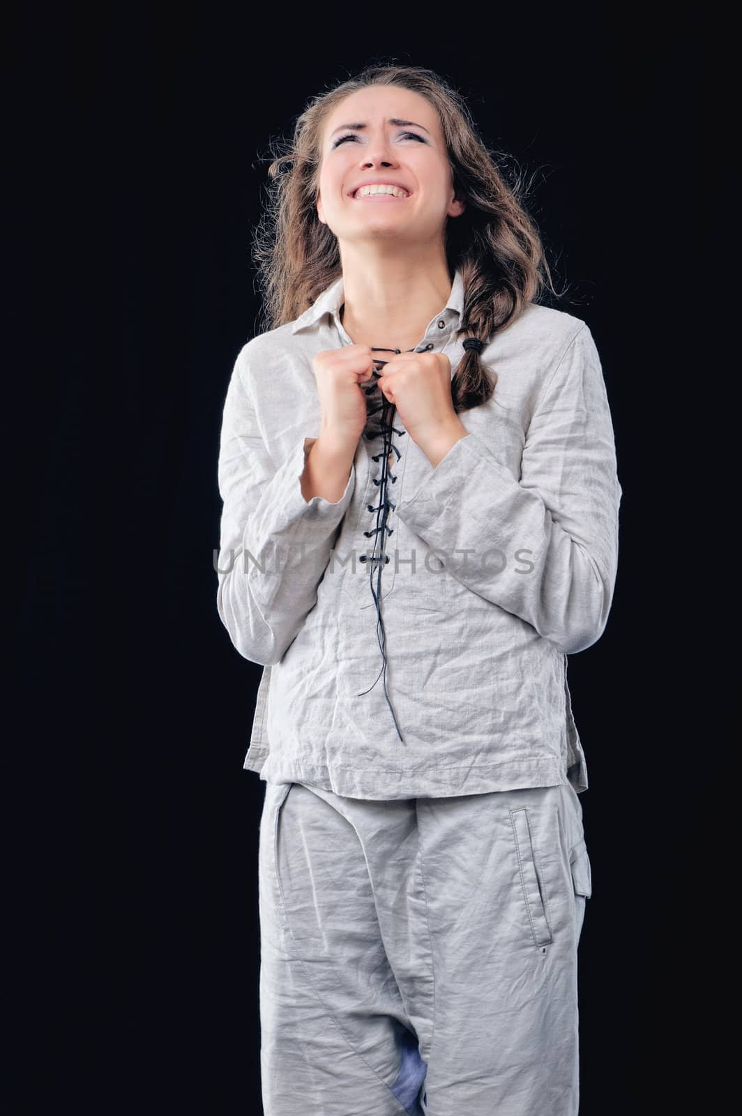 Young woman in white suit, Isolated on black background