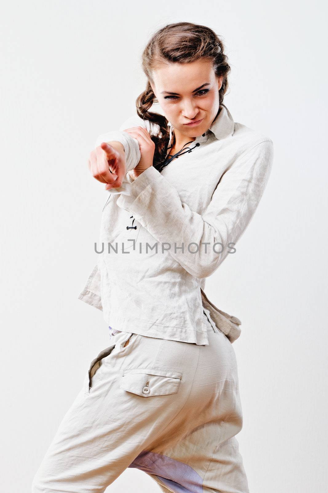 Young woman in white suit, Isolated on white background