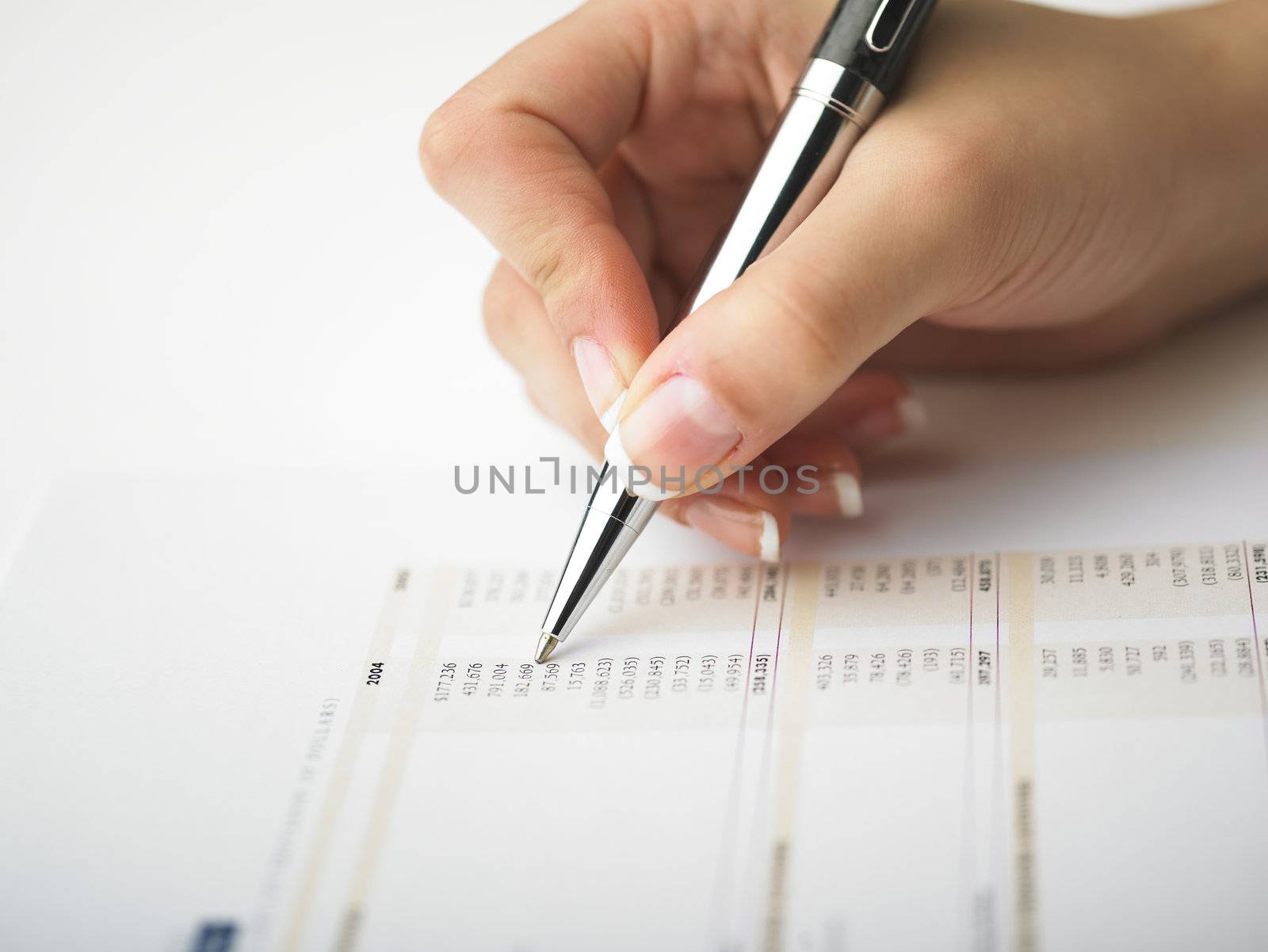 Market Analyze - pen and calculator on papers