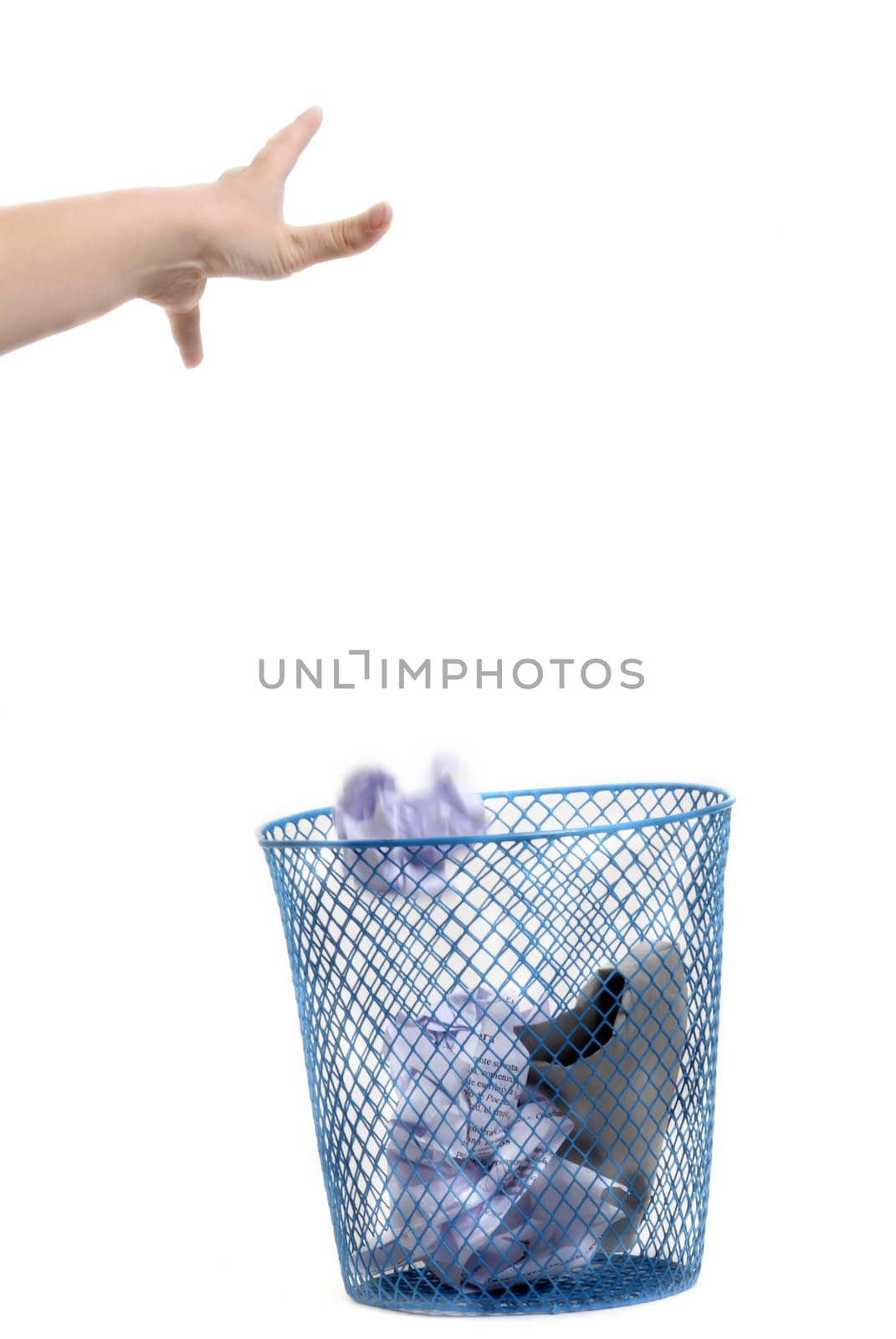 Hand throwing crumpled paper in the Trash isolated on white background 