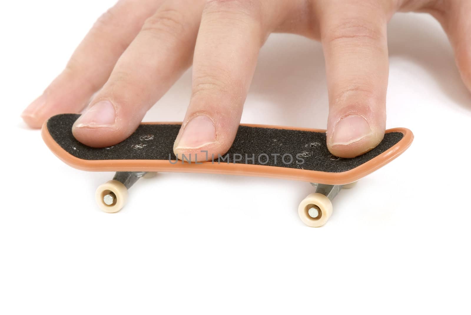 child playing with fingerskate, isolated on white background 