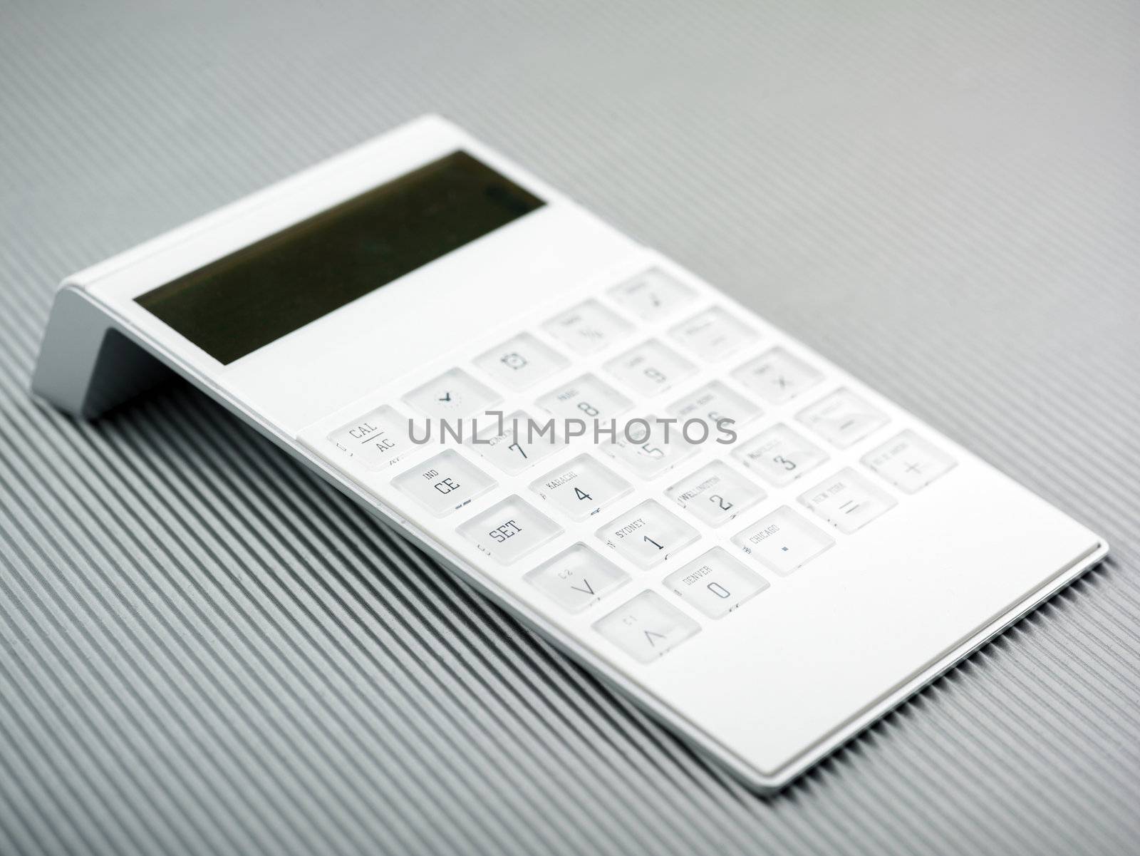 White Calculator On Office Desk