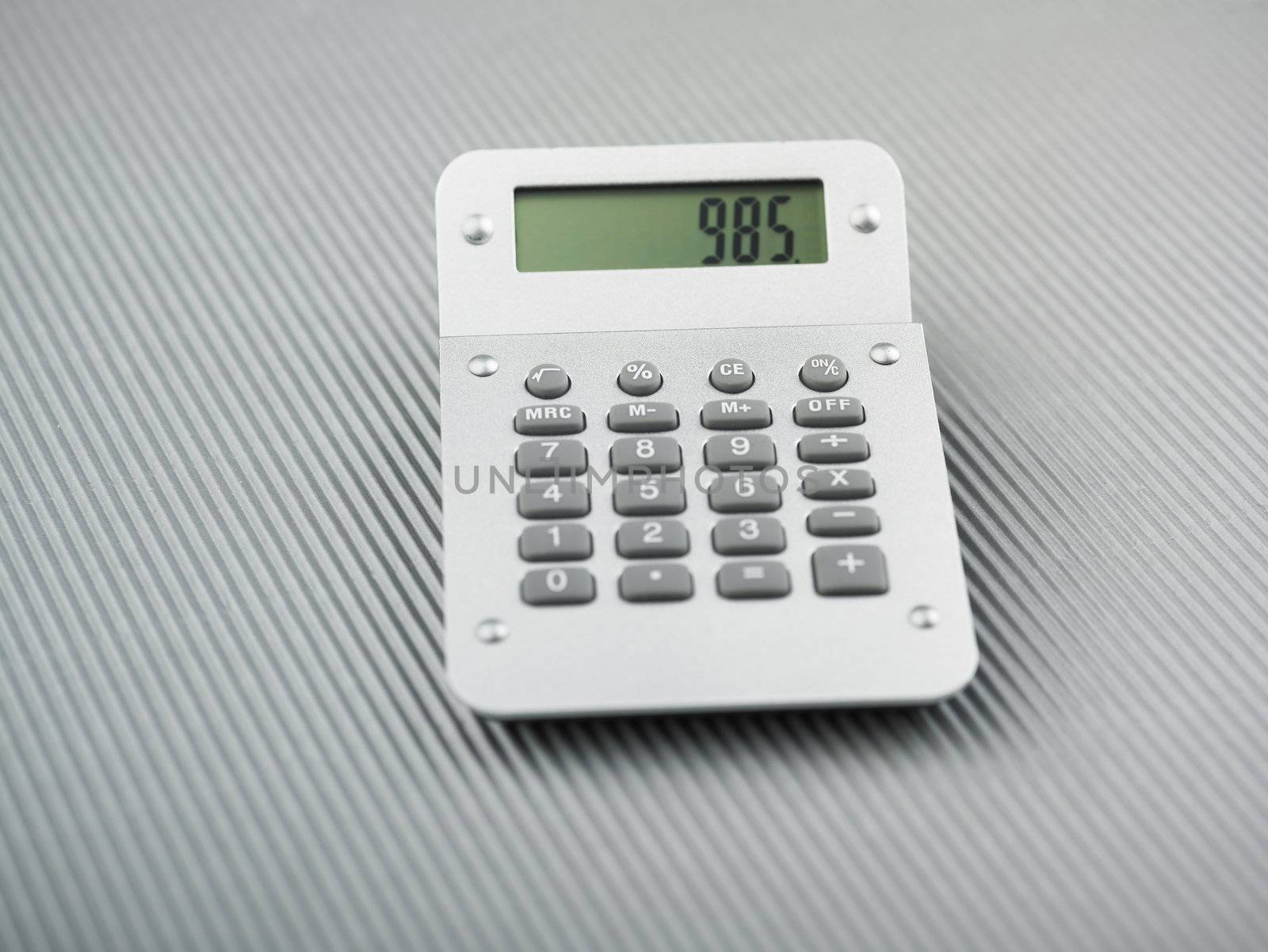 Silver Calculator on office table