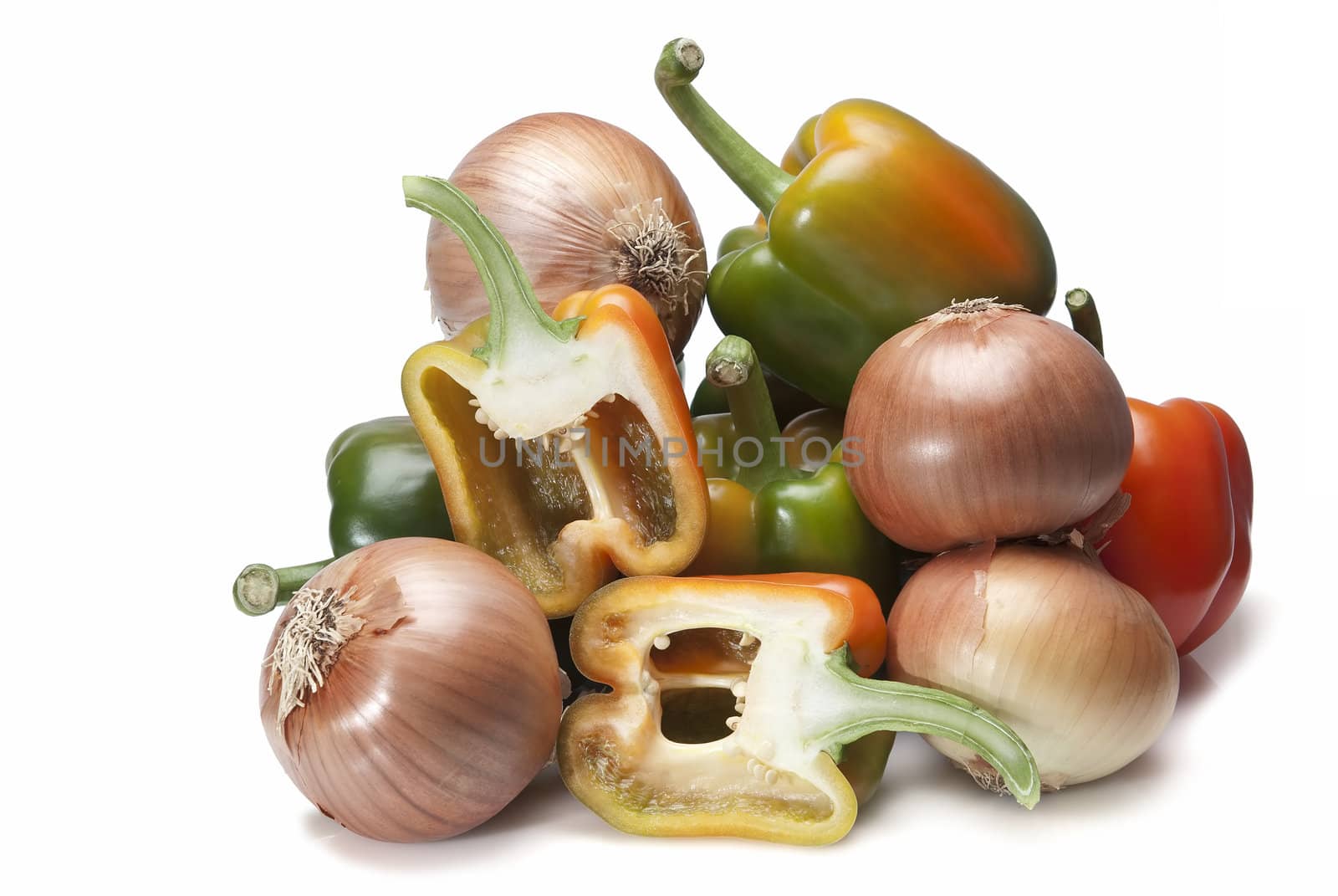 Peppers and onions isolated over a white background.