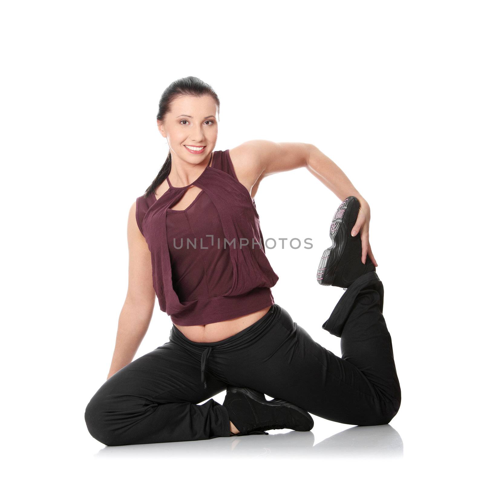 Young woman doing exercise, isolated on white