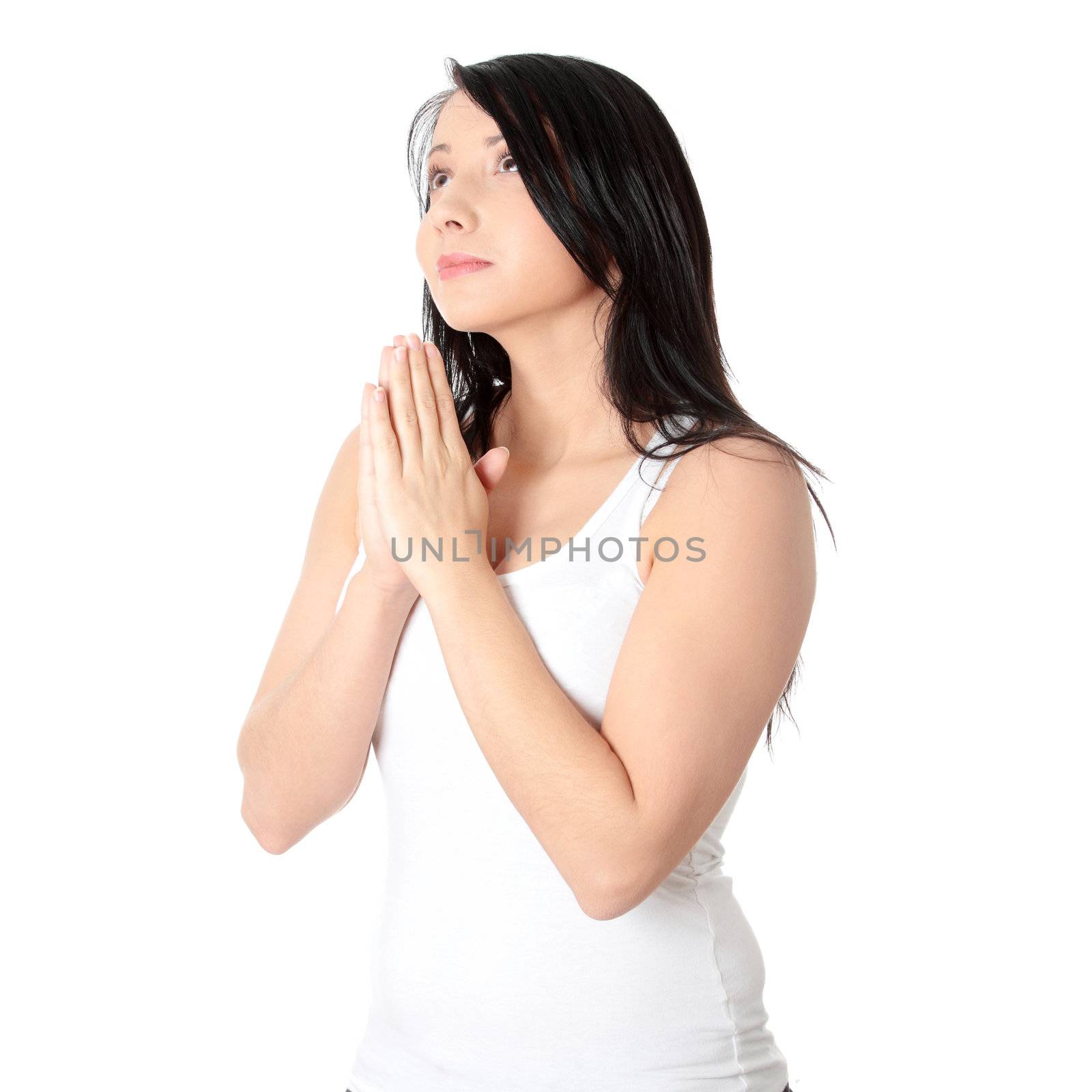 Young caucasian woman praying by BDS